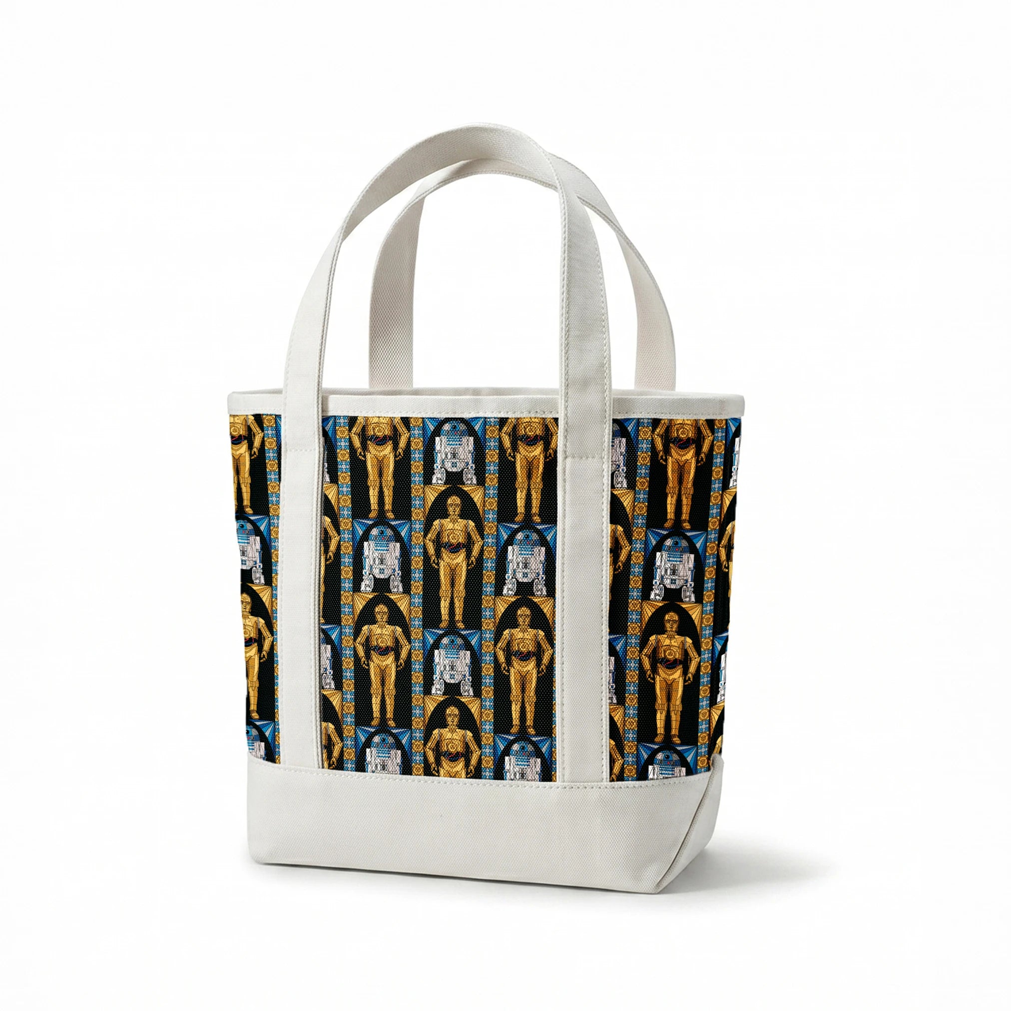 Repeating pattern of golden droid and blue-white astromech droid characters from Star Wars on black background with decorative borders springs canvastote mockup
