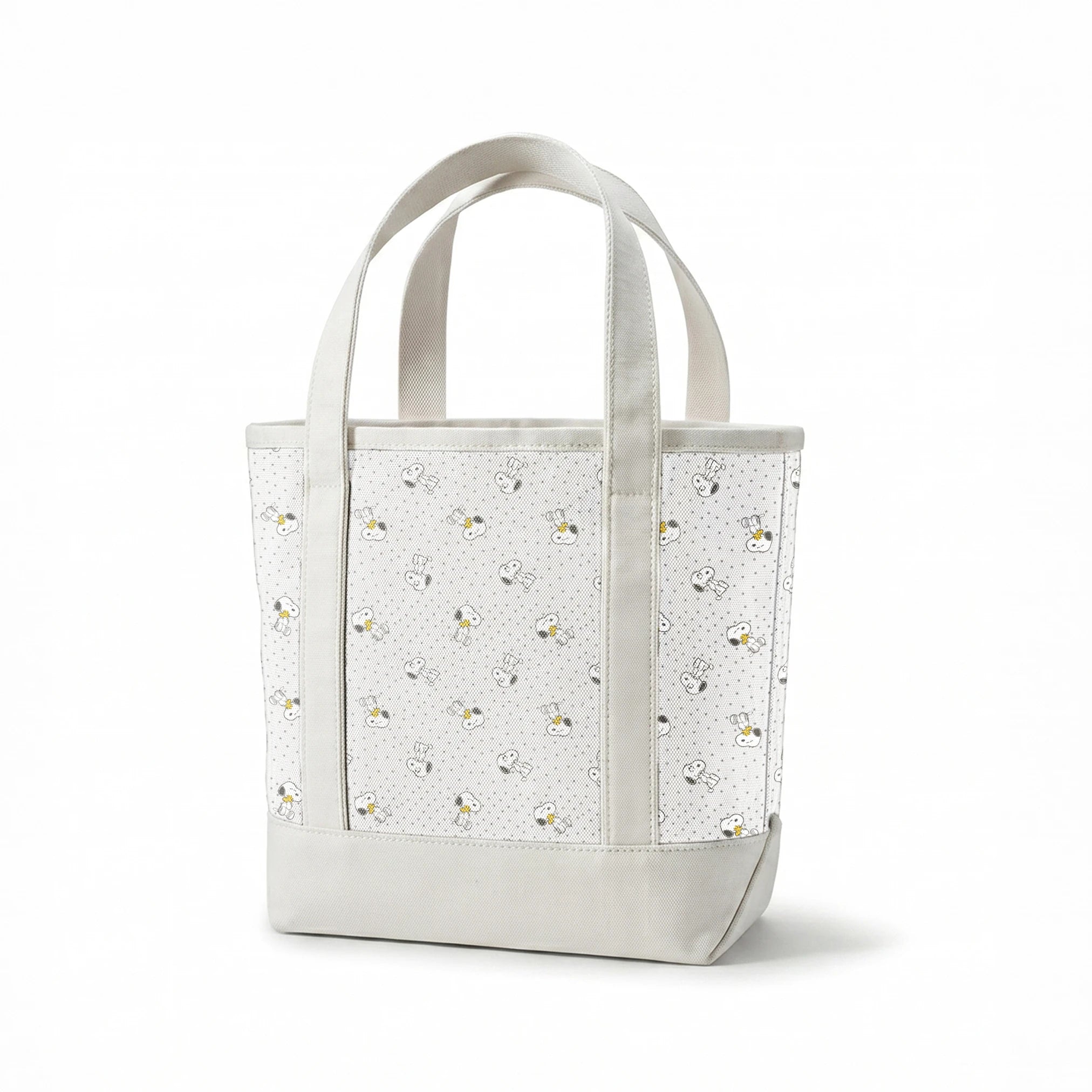 Snoopy and Woodstock on polka dot background in a repeating pattern springs canvastote mockup