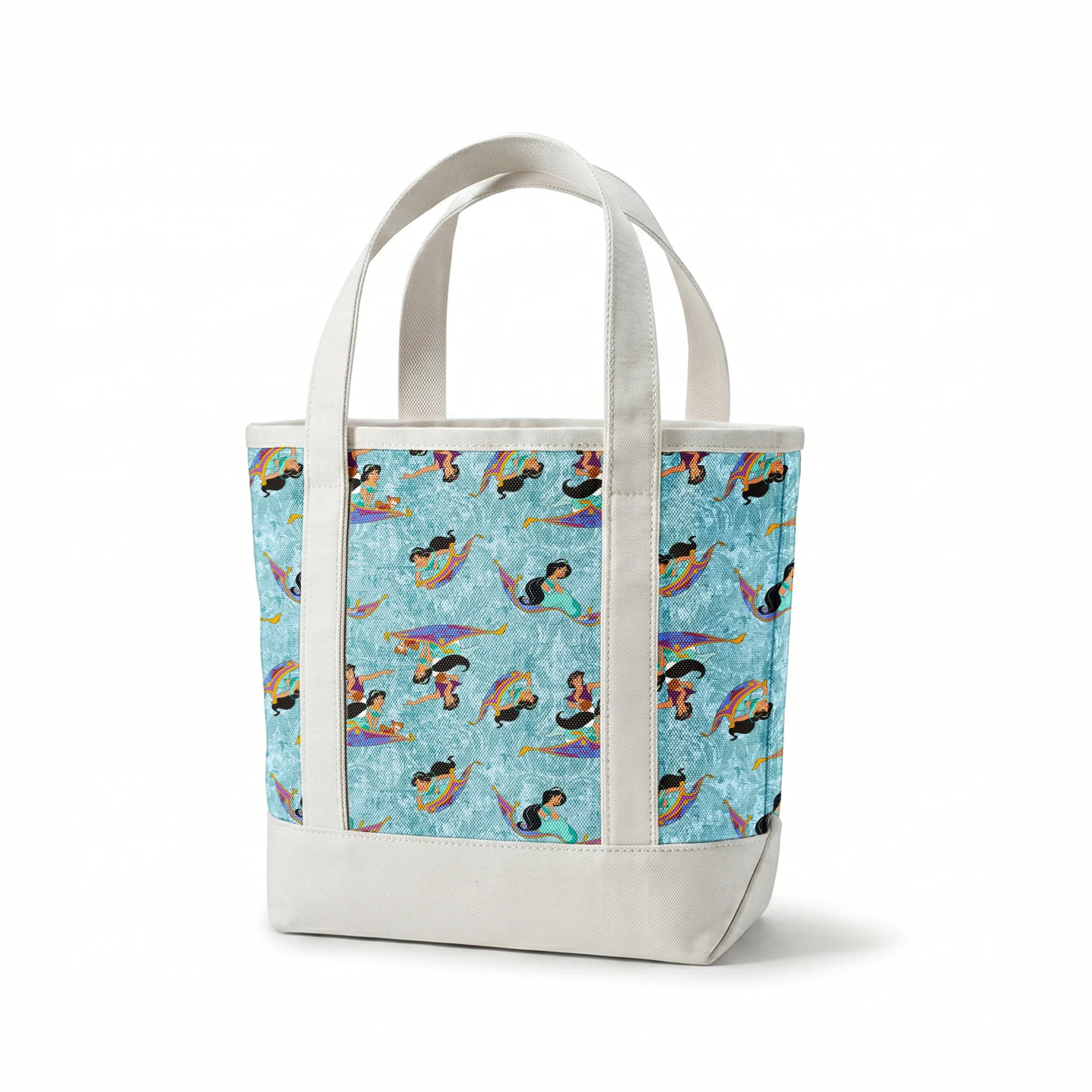 Aladdin and Princess Jasmine riding magic carpets against a light blue marbled background pattern springs canvastote mockup