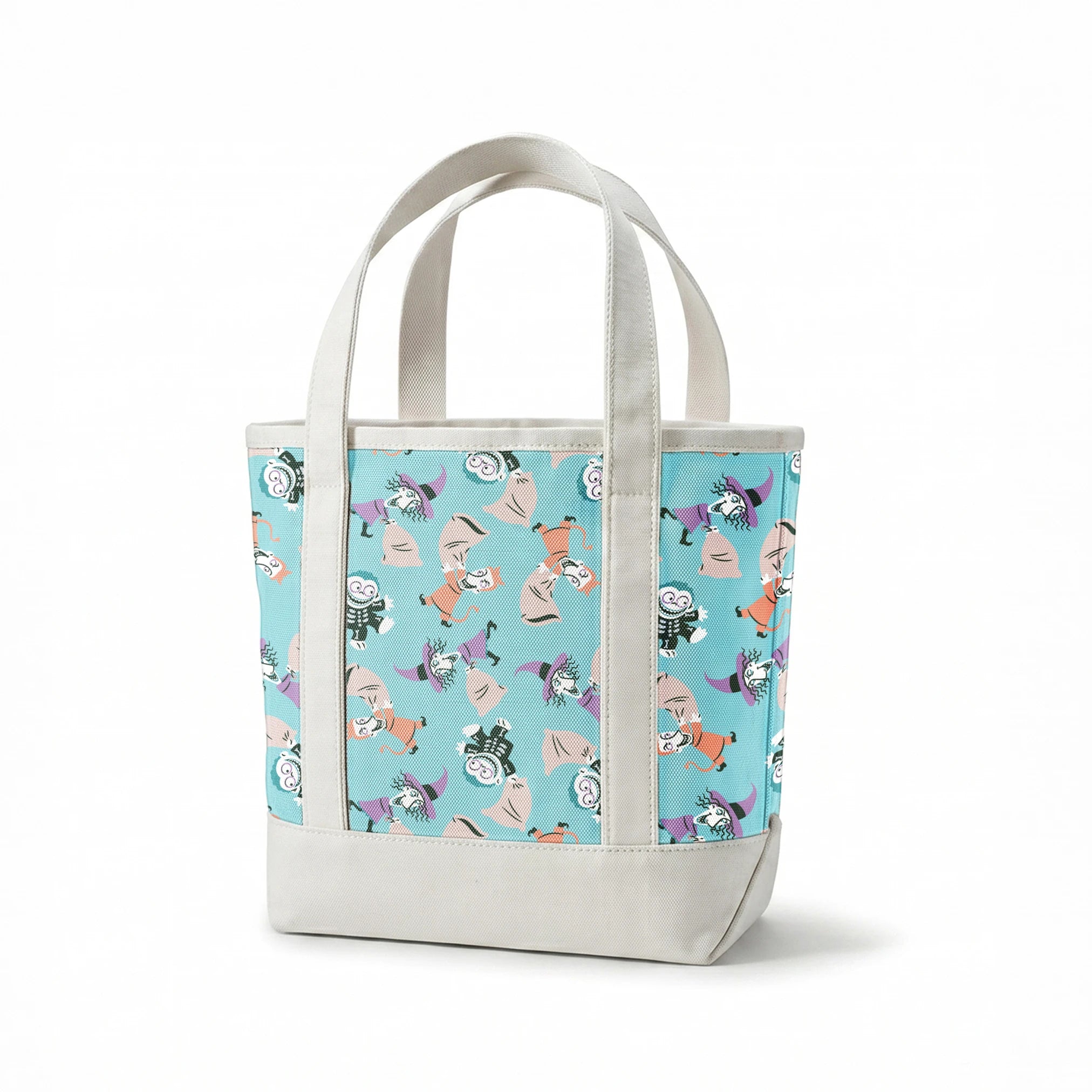 Whimsical pattern of cartoon characters in Halloween costumes on light blue background springs canvastote mockup