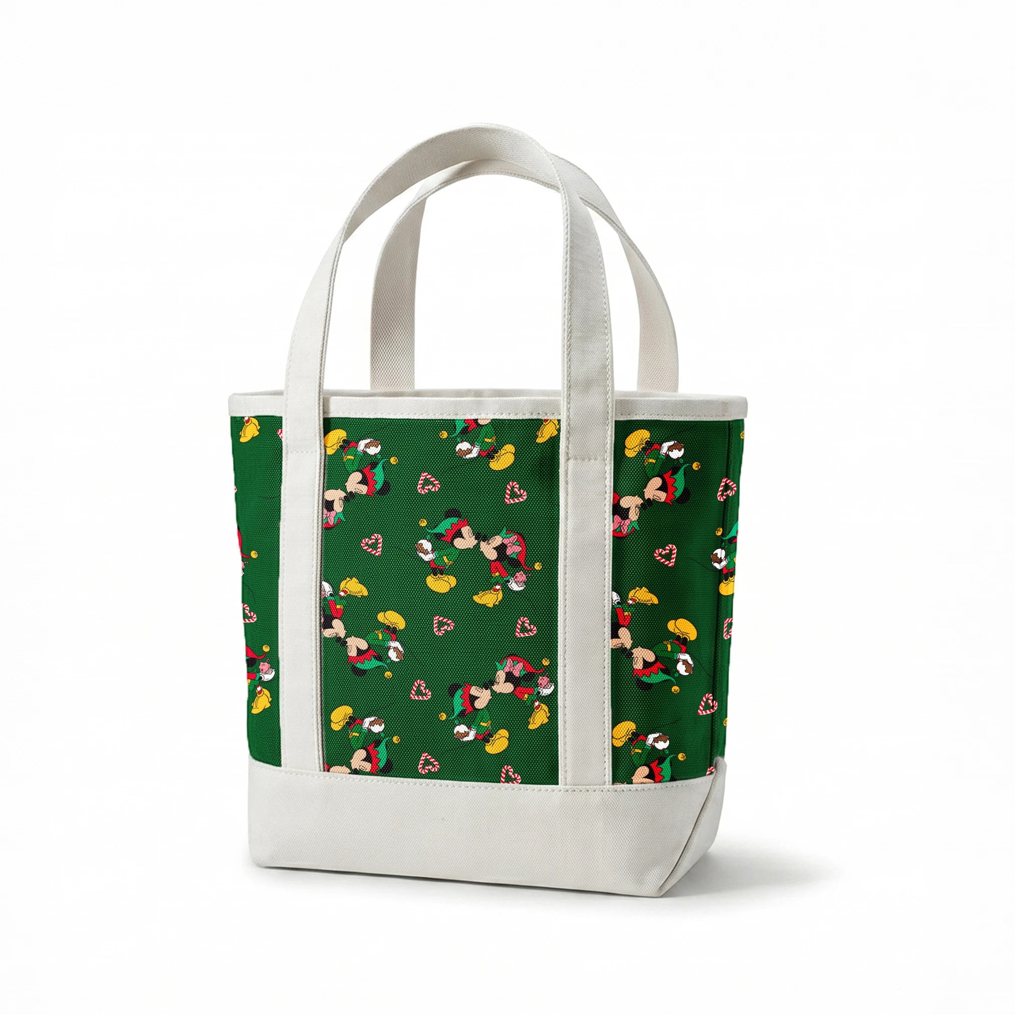 Festive Mickey Mouse pattern with candy canes on green background springs canvastote mockup