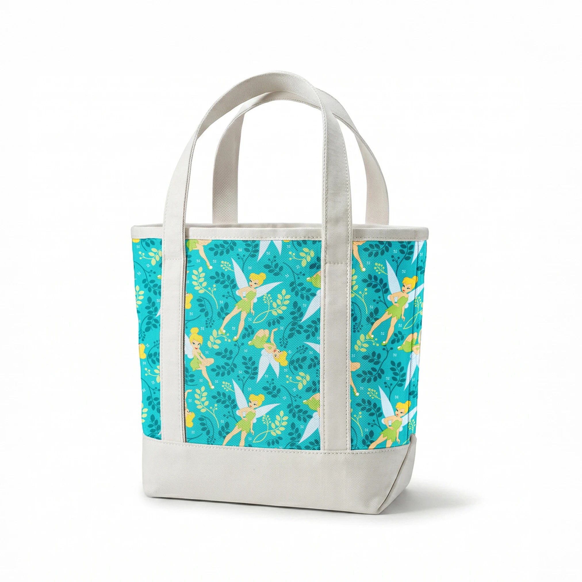 A whimsical pattern featuring Tinker Bell against a teal background with decorative green foliage and yellow accents. springs canvastote mockup