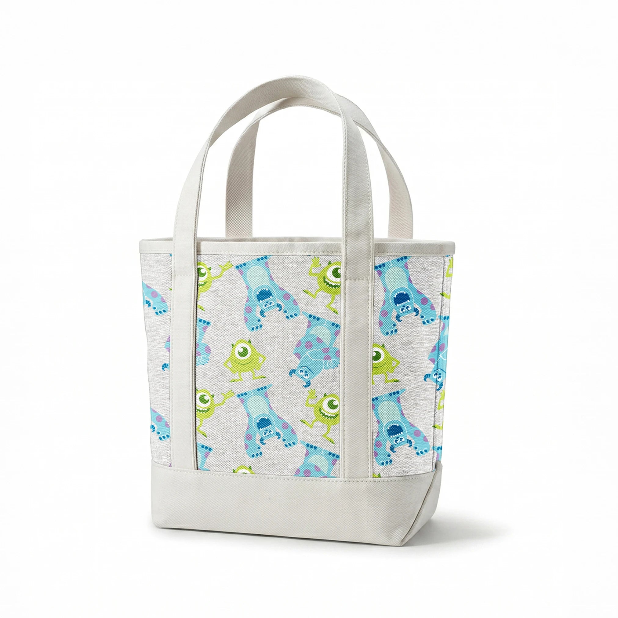 Cartoon pattern of Monsters Inc characters on light gray background springs canvastote mockup