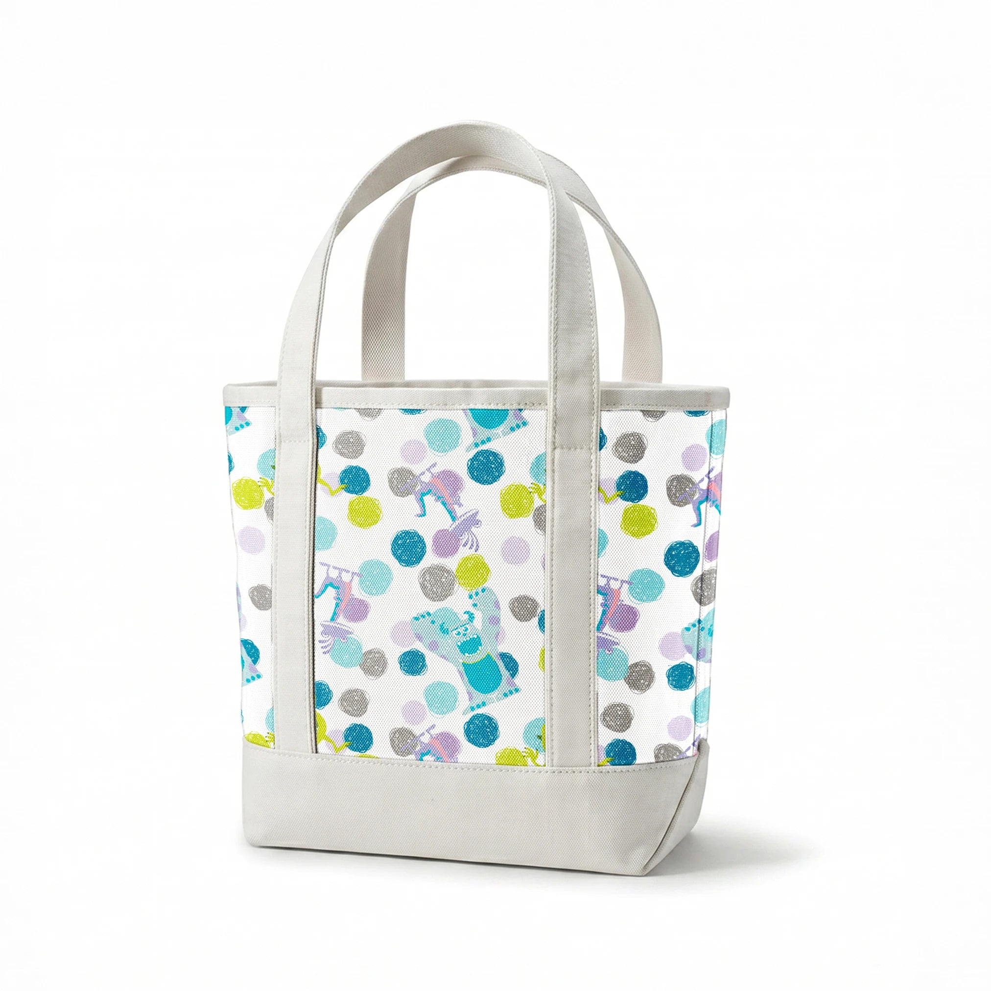 Colorful pattern featuring cartoon monsters with polka dots in blue, green, and purple on white background springs canvastote mockup