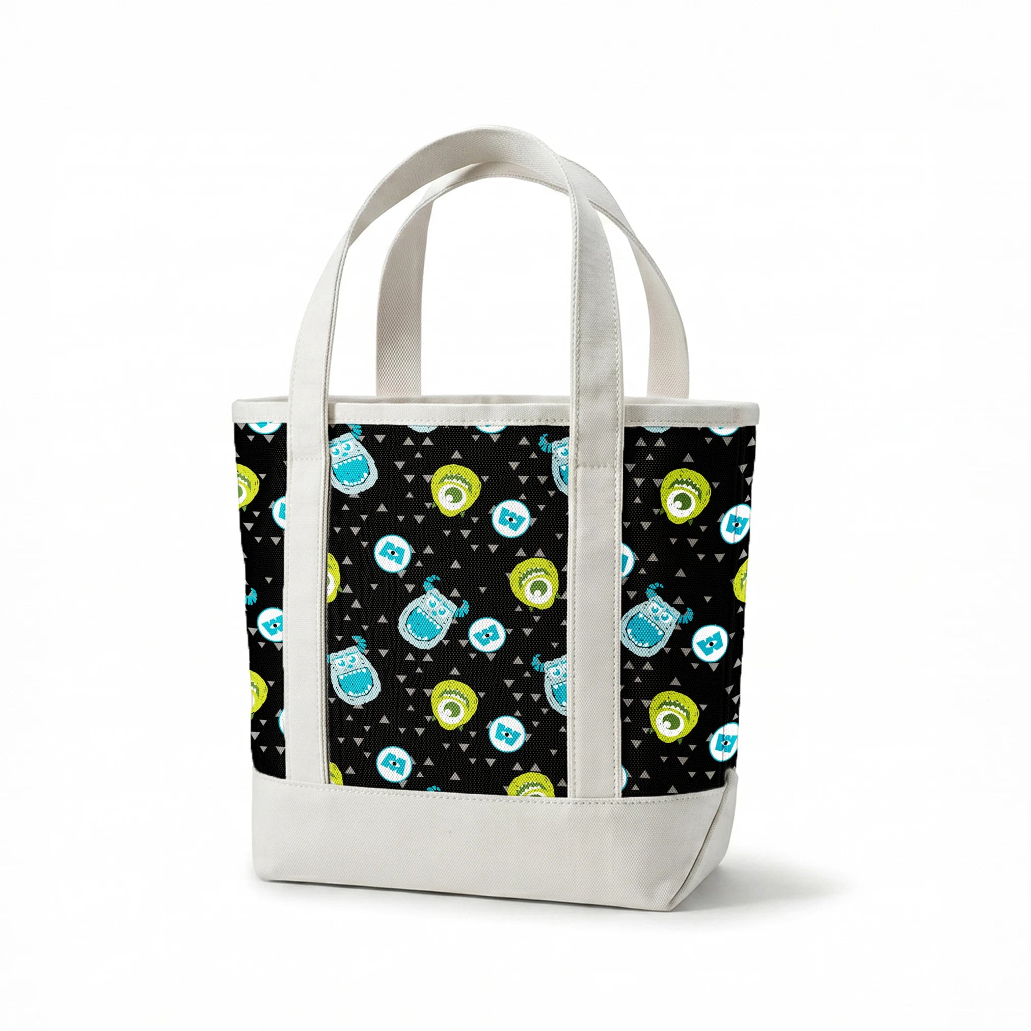Monsters Inc pattern with Mike and Sulley on black background with gray triangles springs canvastote mockup