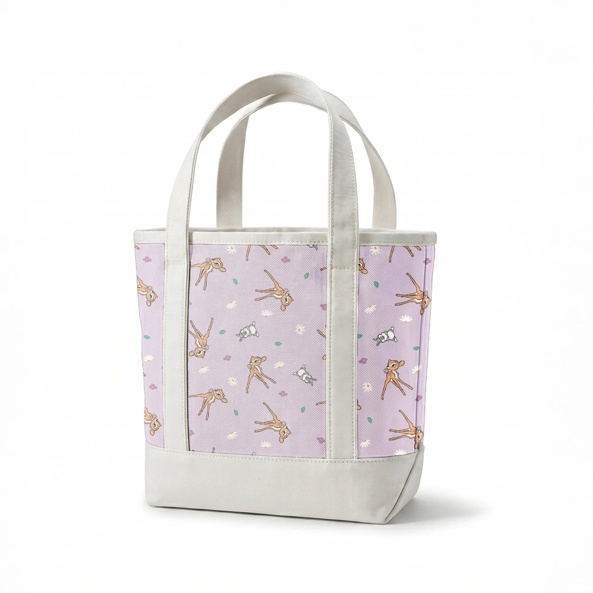 Seamless pattern of cartoon deer and bunnies with daisies and small flowers on lavender background springs canvastote mockup