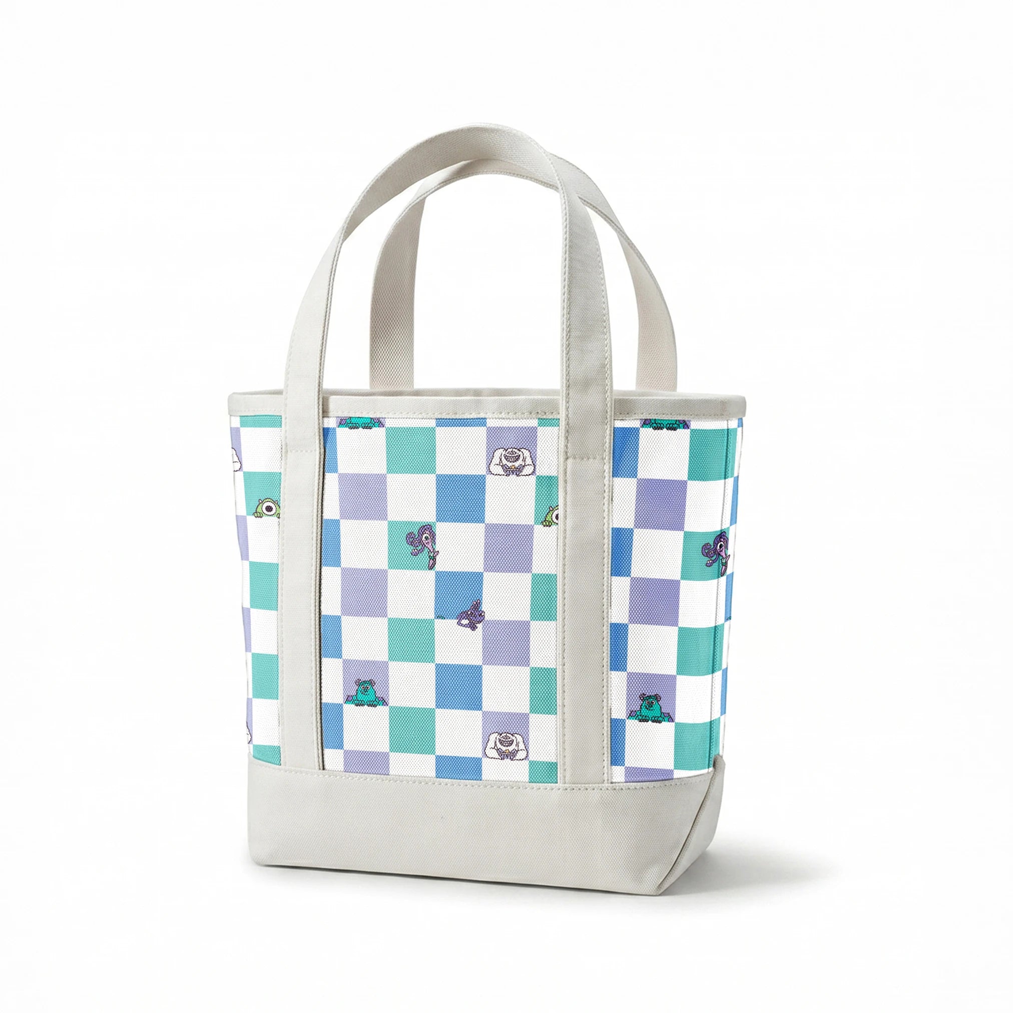 Monsters Inc characters on a checkered pattern of white, mint green, light purple, and blue squares springs canvastote mockup