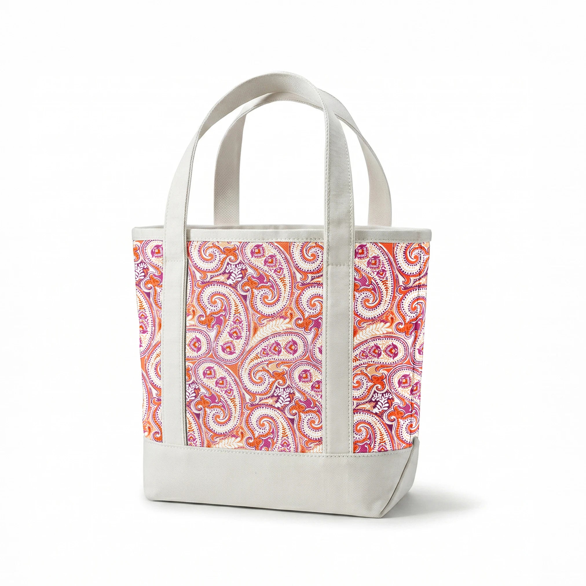 Vibrant paisley pattern in orange, pink and purple with swirling teardrop motifs and ornate details springs canvastote mockup