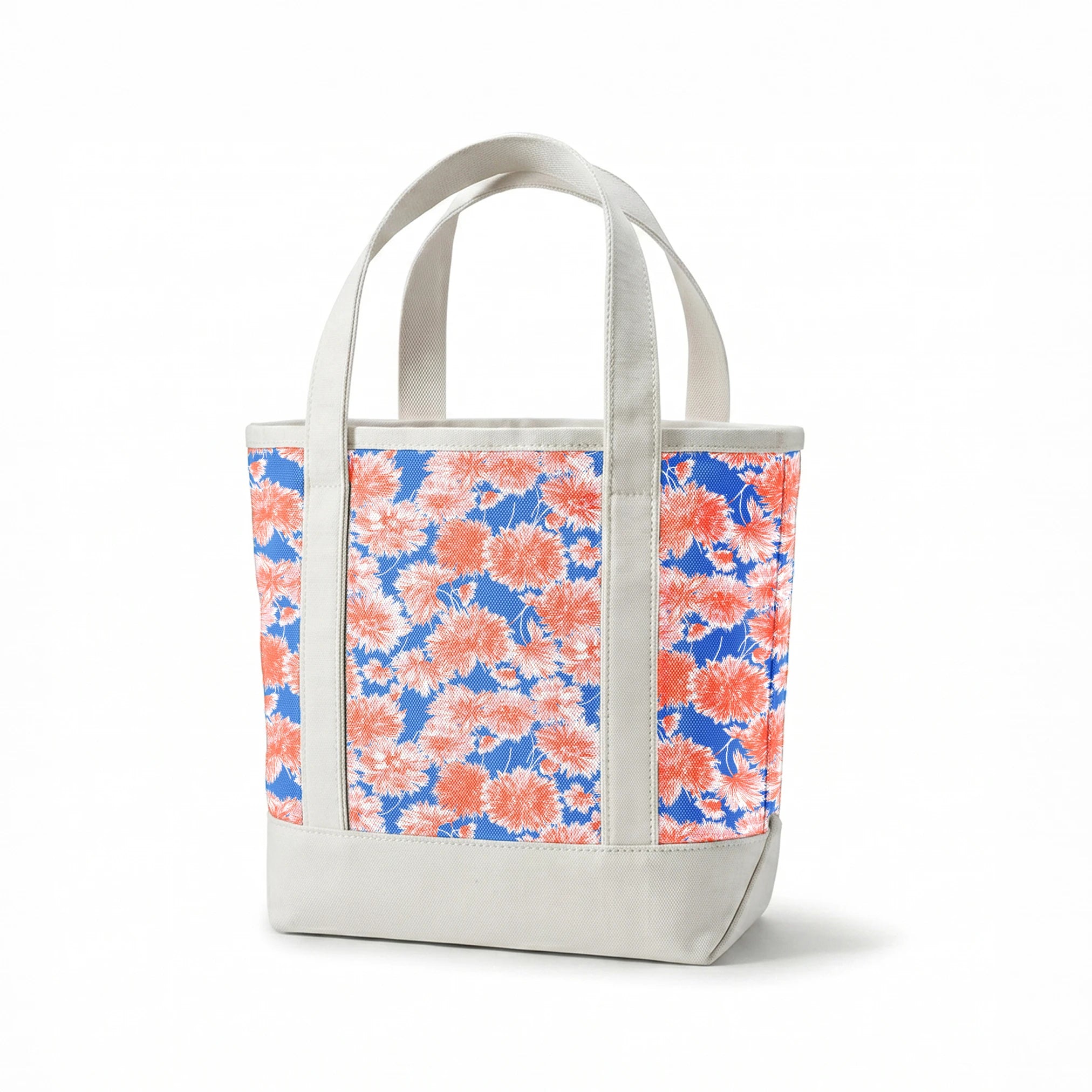 Coral pink floral pattern of chrysanthemums or dahlias on bright blue background springs canvastote mockup