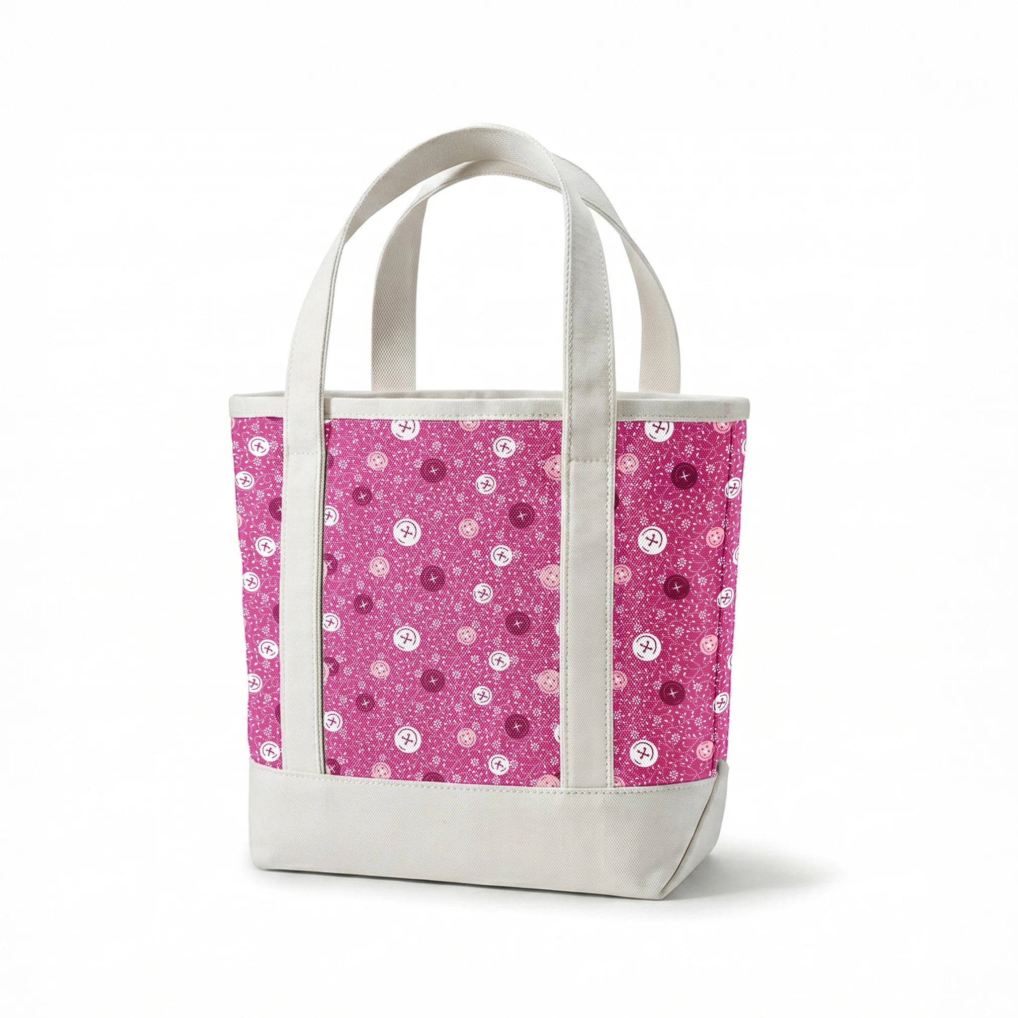Magenta background with white floral pattern and buttons scattered throughout springs canvastote mockup
