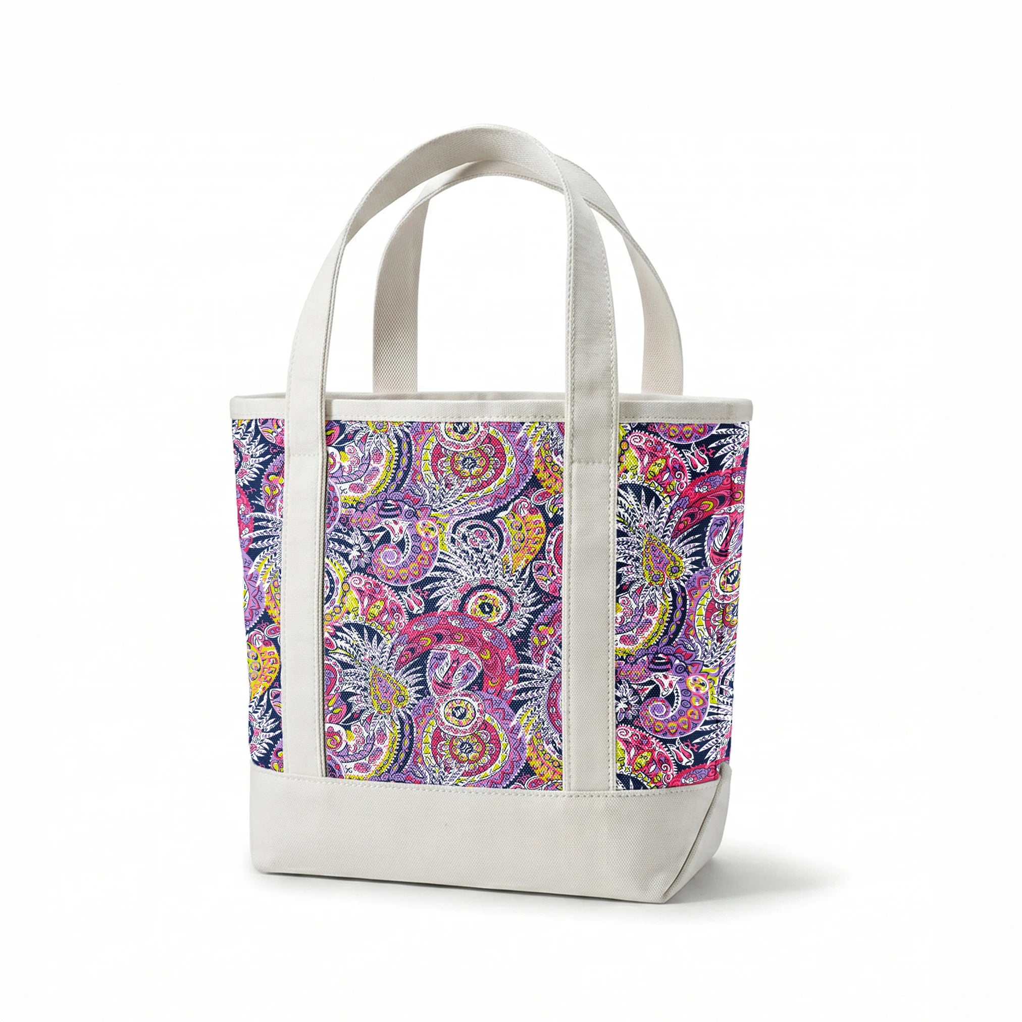 Vibrant paisley pattern in pink, purple, yellow, and blue with intricate swirling designs springs canvastote mockup