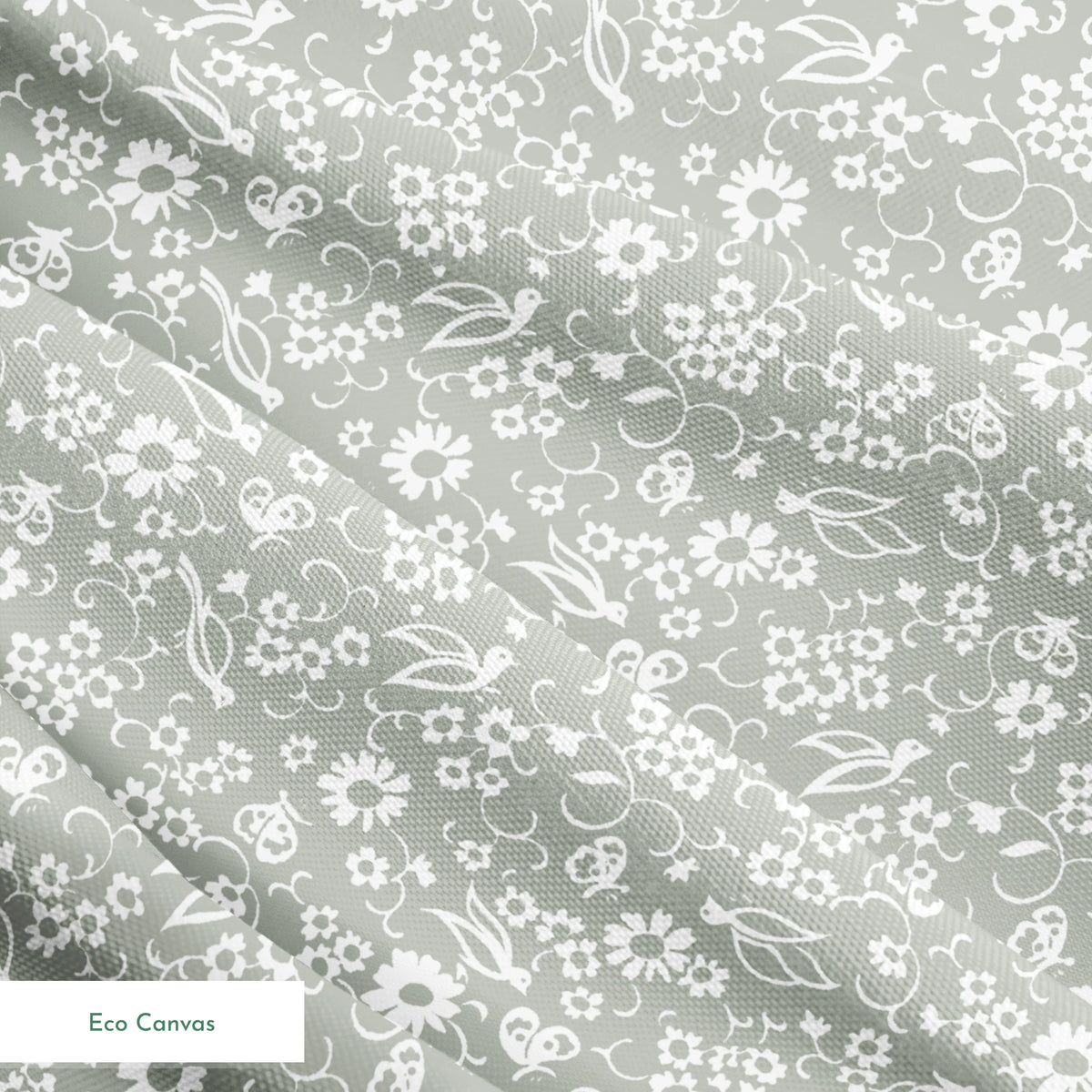 White vintage-style bird and floral silhouettes on a soft gray background. springs ecocanvas texture
