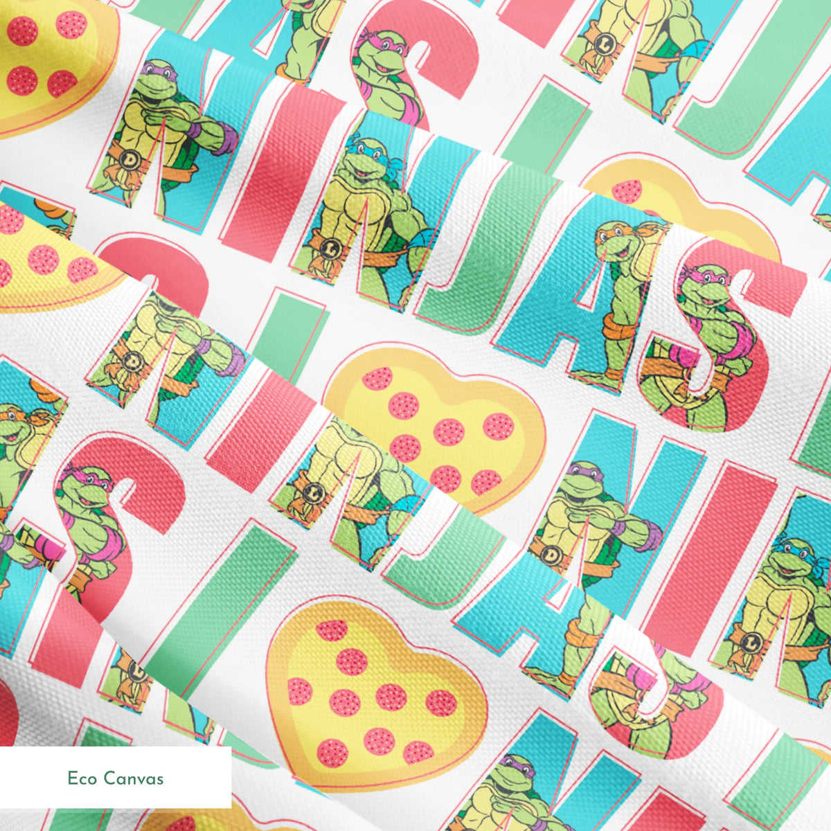 Teenage Mutant Ninja Turtles design with “I heart Ninjas” text with a pizza heart graphic, and Michelangelo and Leonardo in pastel colors. springs ecocanvas texture