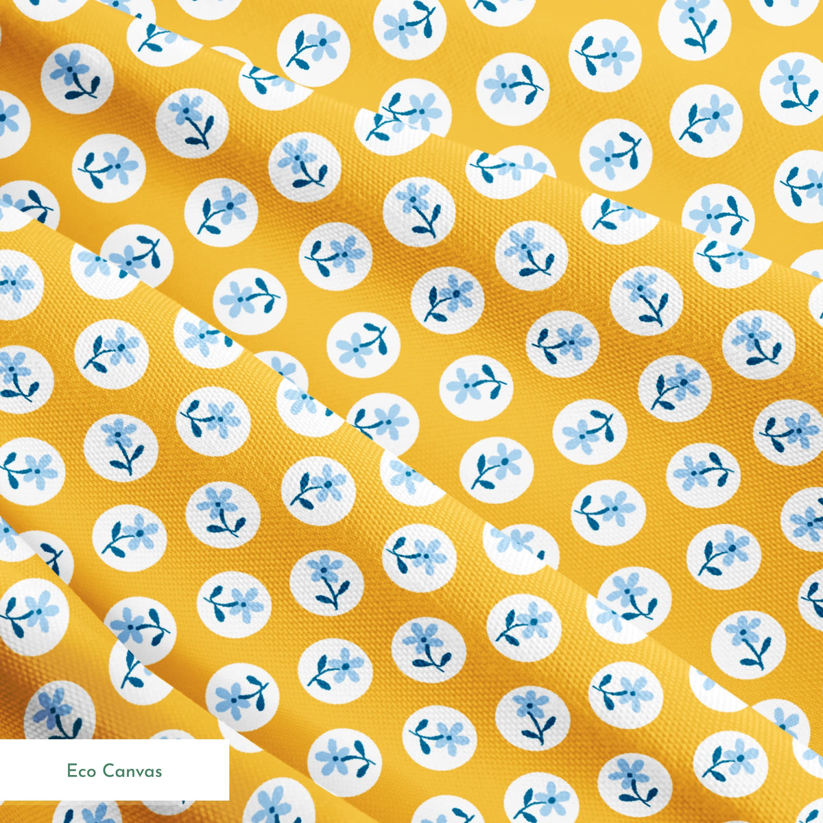 Light blue flowers with navy stems in white circles on a mustard yellow background springs ecocanvas texture