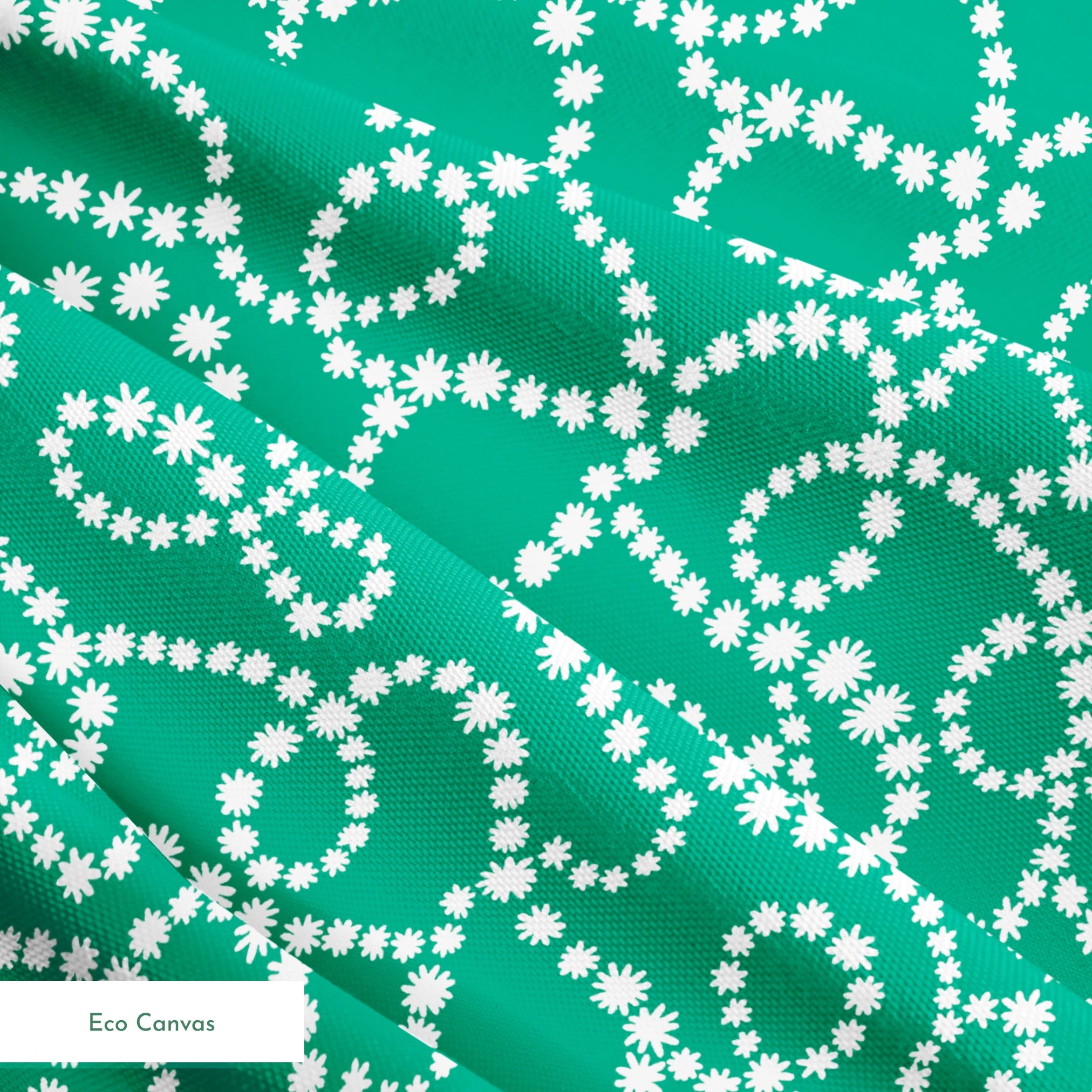 White dotted swirling patterns on green background forming abstract curving lines springs ecocanvas texture