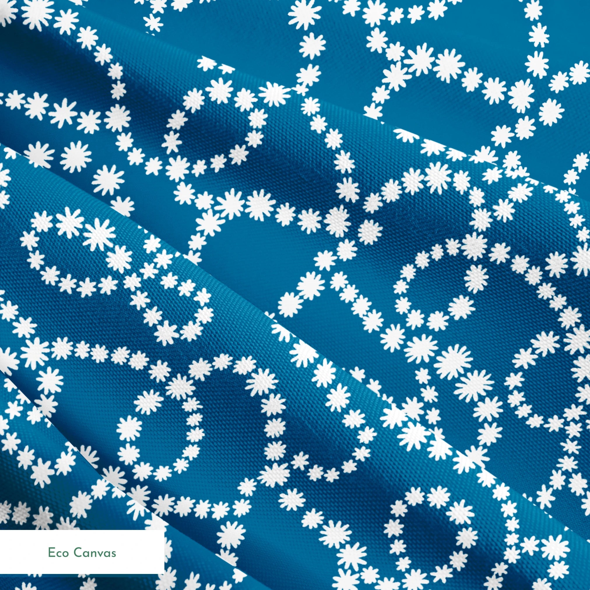 Dotted white swirling patterns on deep teal blue background creating abstract curved designs springs ecocanvas texture
