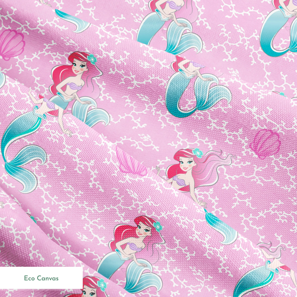The Little Mermaid pattern with Ariel and purple seashells on pink background with white bubbles springs ecocanvas texture