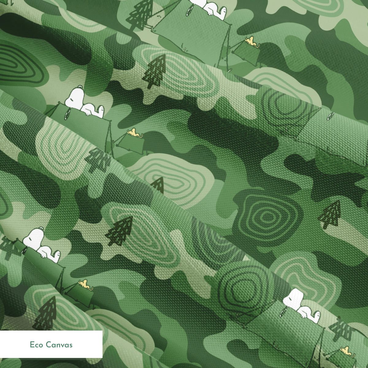 Snoopy camping scene with tents and trees on a green camouflage pattern background springs ecocanvas texture