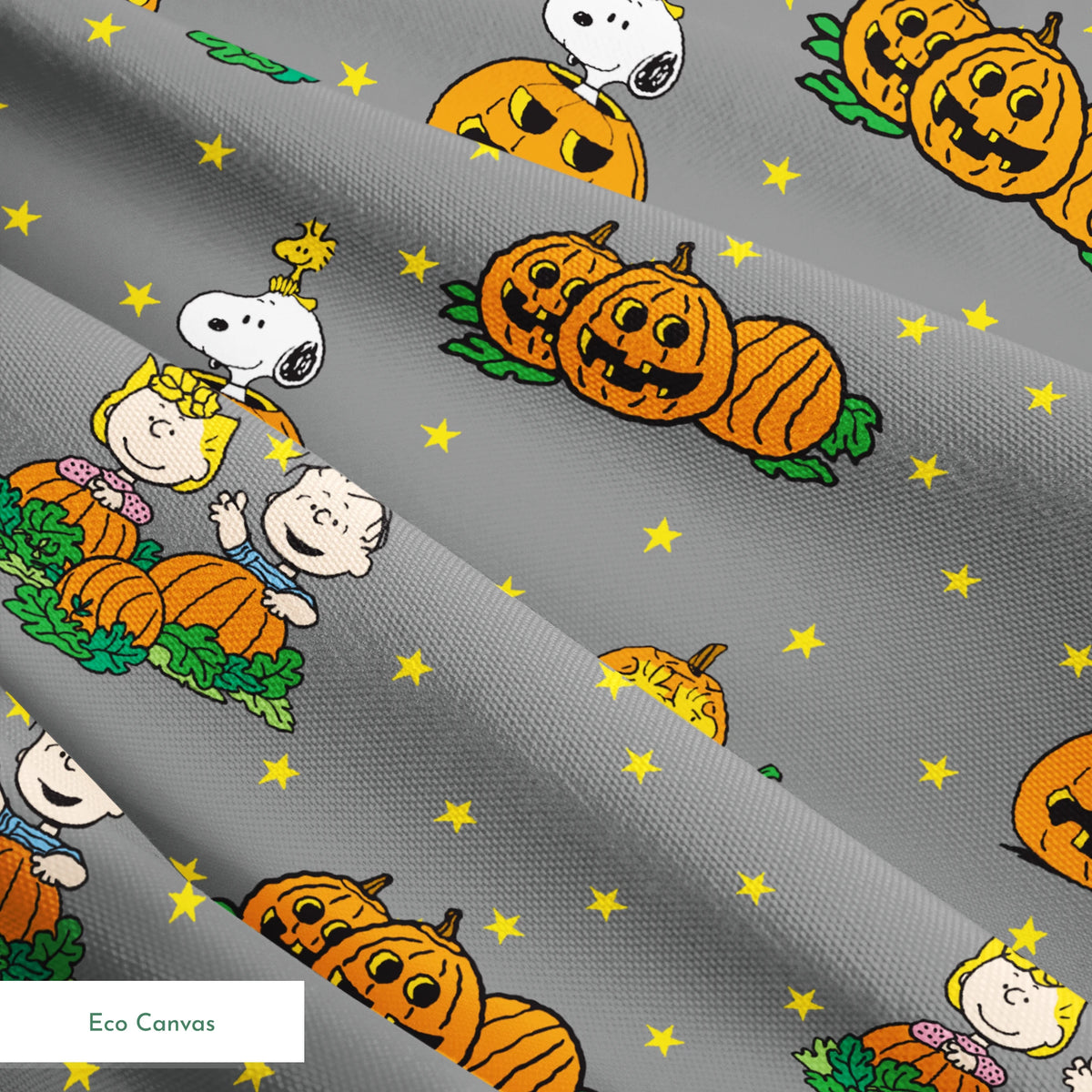 Peanuts Halloween pattern with Snoopy on pumpkins, Peanuts characters in pumpkin patches, and yellow stars on gray background. springs ecocanvas texture