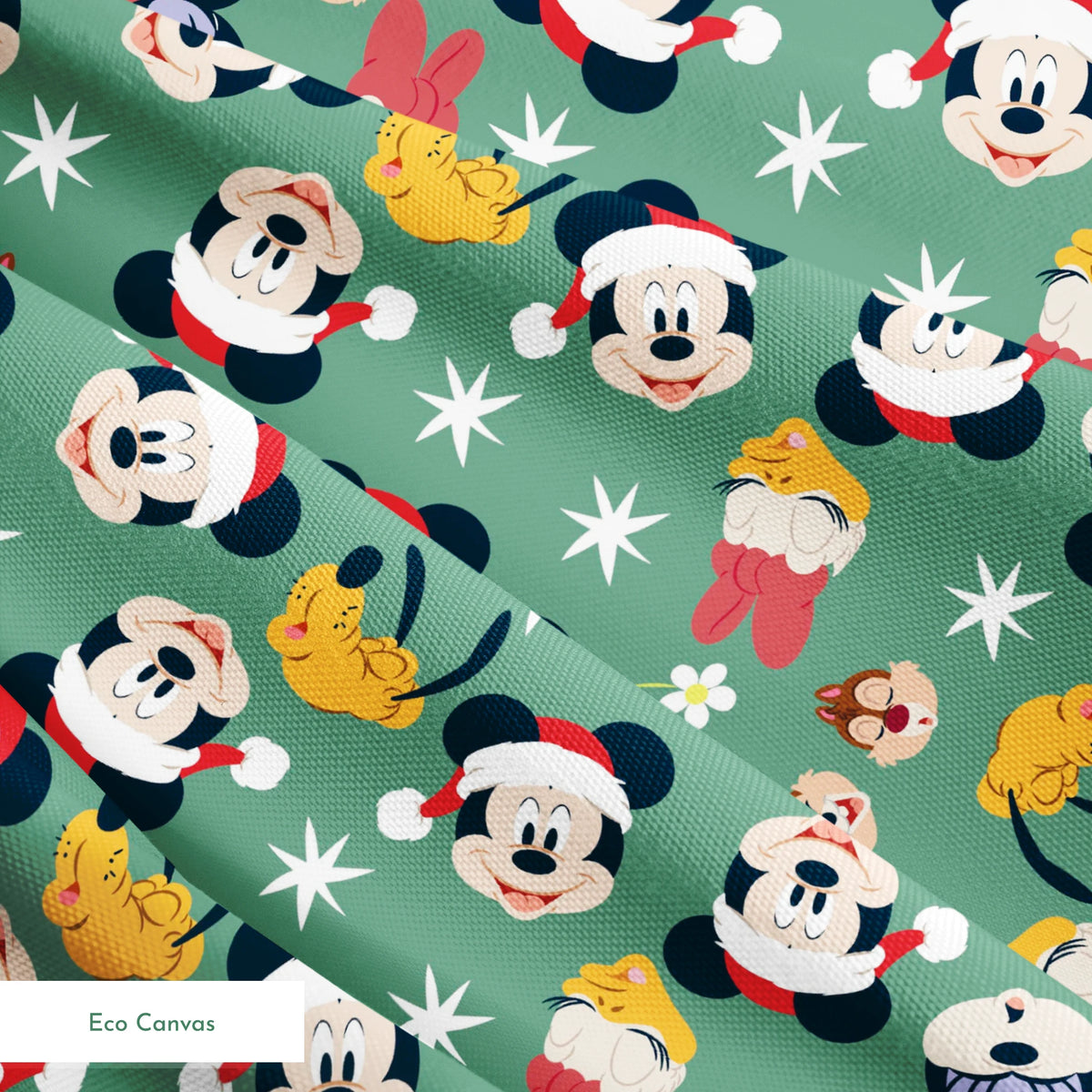 Mickey Mouse holiday pattern with characters wearing Santa hats on green background with stars and ornaments springs ecocanvas texture