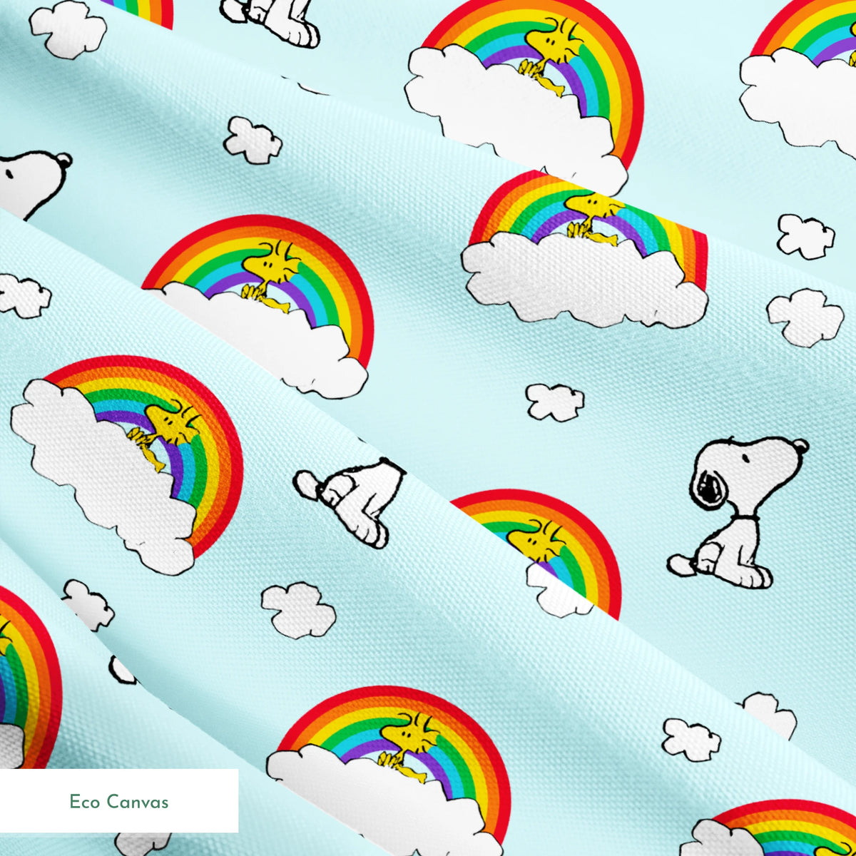 Snoopy and Woodstock characters on light blue background with rainbows, clouds and white fluffy clouds springs ecocanvas texture