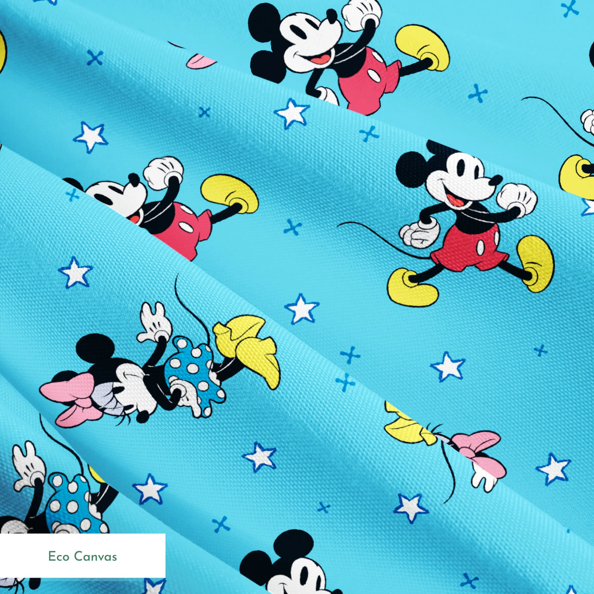 Disney Mickey Mouse and Minnie Mouse characters on light blue background with white stars, pattern design springs ecocanvas texture