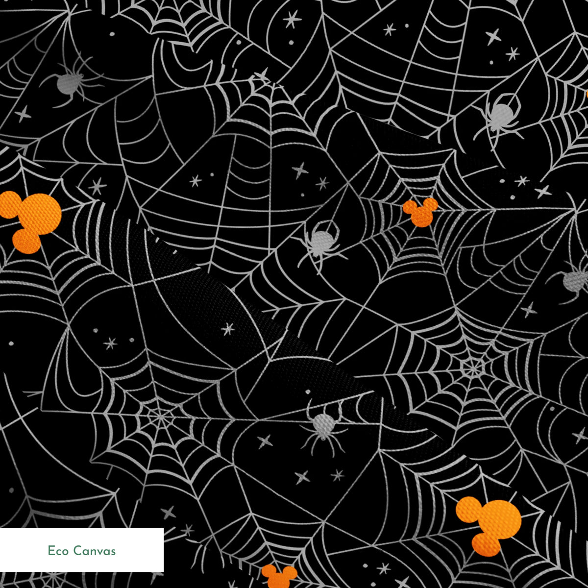 Spooky Halloween pattern with white spiderwebs, orange Mickey Mouse heads, and gray spiders on black background springs ecocanvas texture