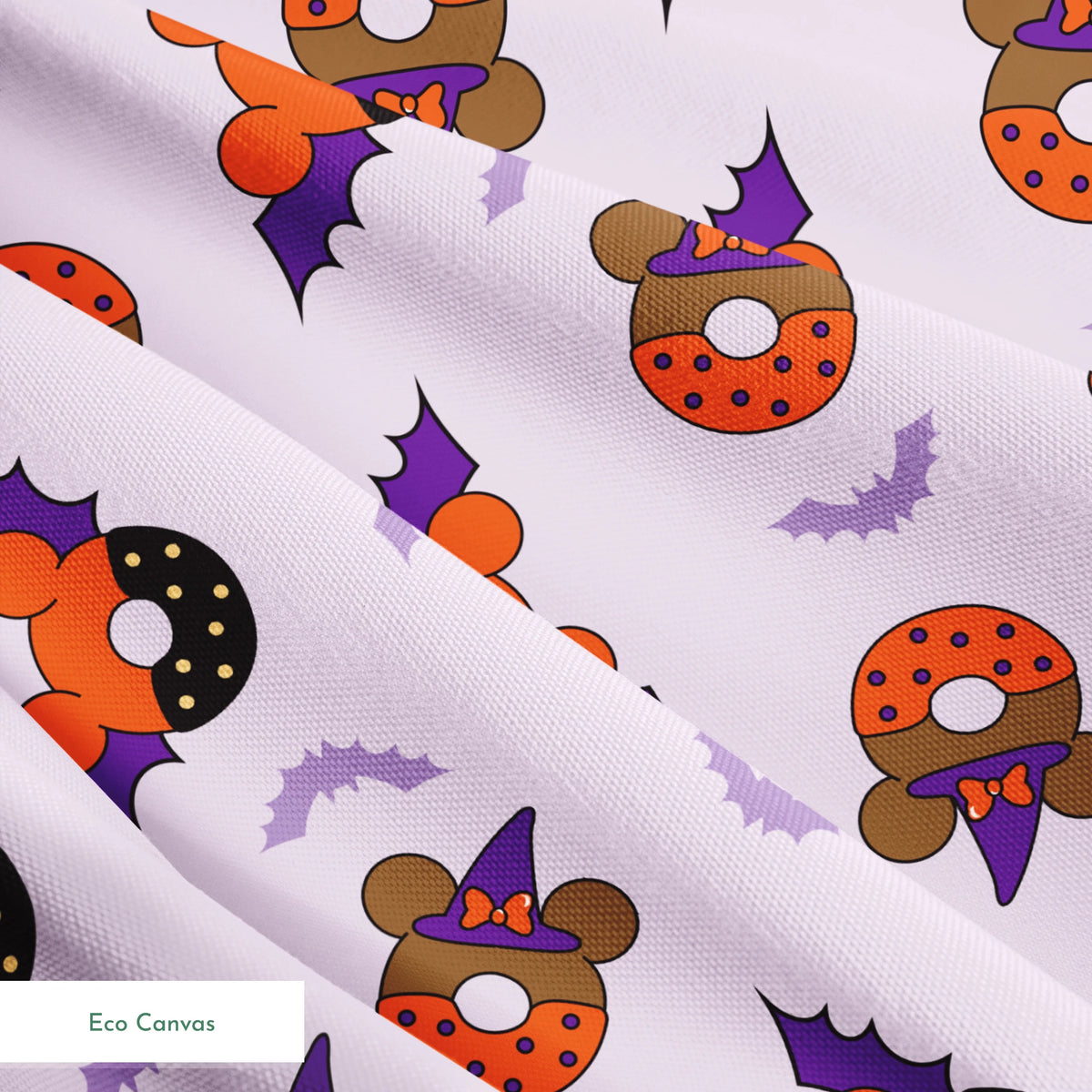 Disney Halloween-themed pattern with orange and black donuts, purple bat wings, and light purple bats on lavender background springs ecocanvas texture
