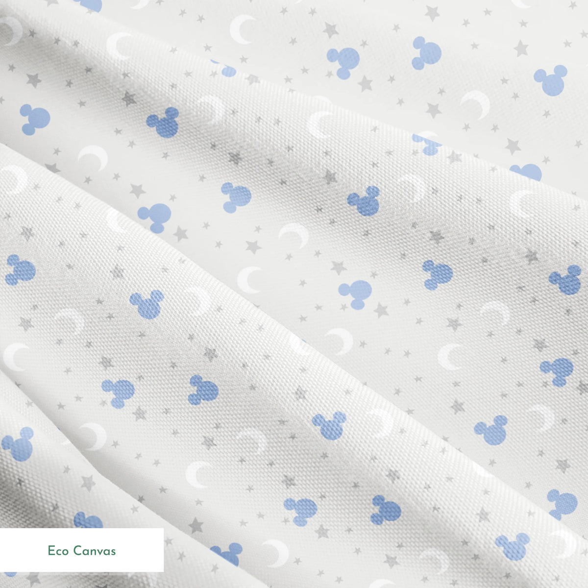Blue Mickey Mouse silhouettes with white moons and gray stars on light gray background springs ecocanvas texture