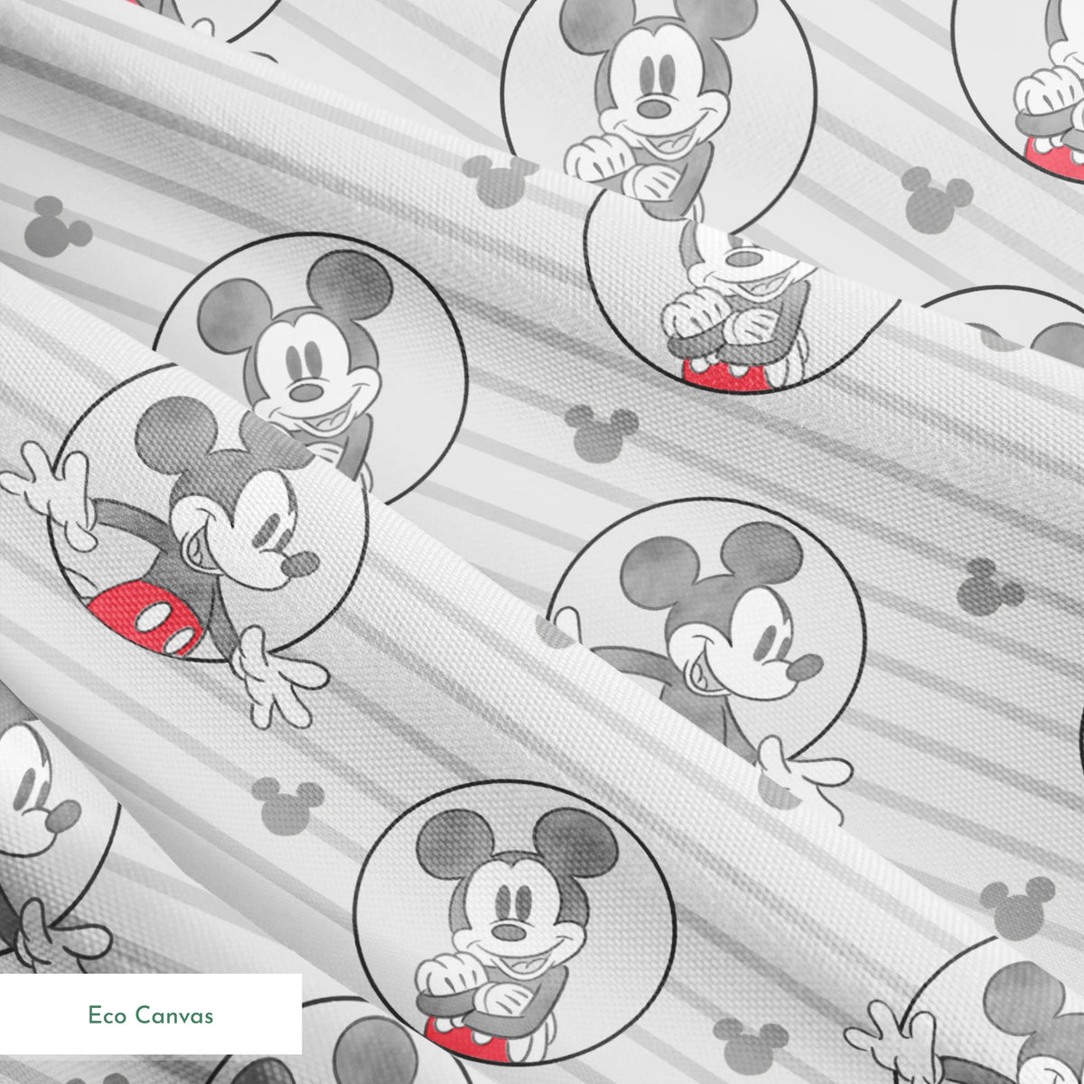 Mickey Mouse pattern on gray striped background with circular character portraits in red, black, and white springs ecocanvas texture