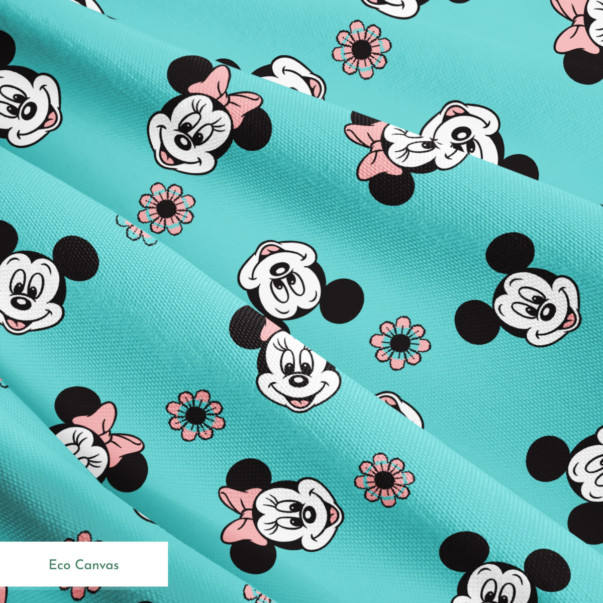 Mickey and Minnie Mouse cartoon faces scattered on turquoise background with small flowers springs ecocanvas texture