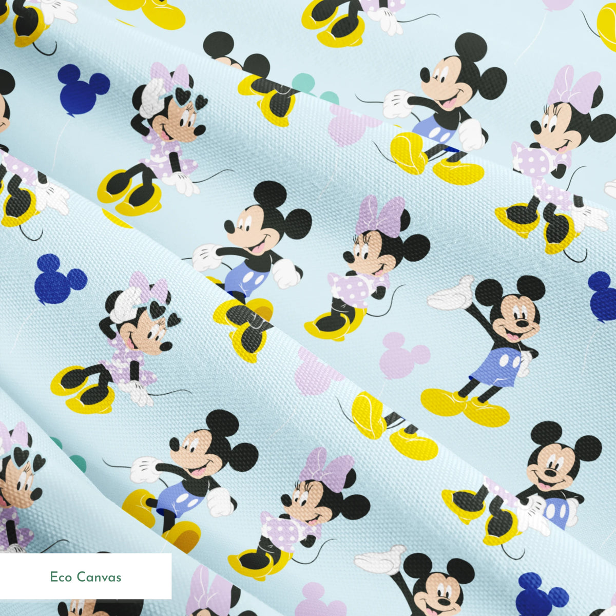 Pattern of Mickey and Minnie Mouse characters in various poses on light blue background springs ecocanvas texture