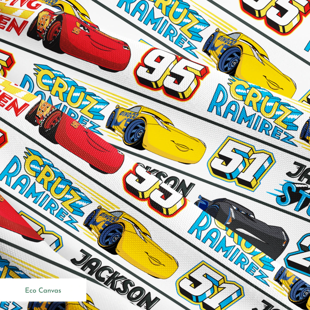 Disney Cars character ribbon with Lightning McQueen 95, Cruz Ramirez 51, and Jackson Storm 20 repeated pattern springs ecocanvas texture