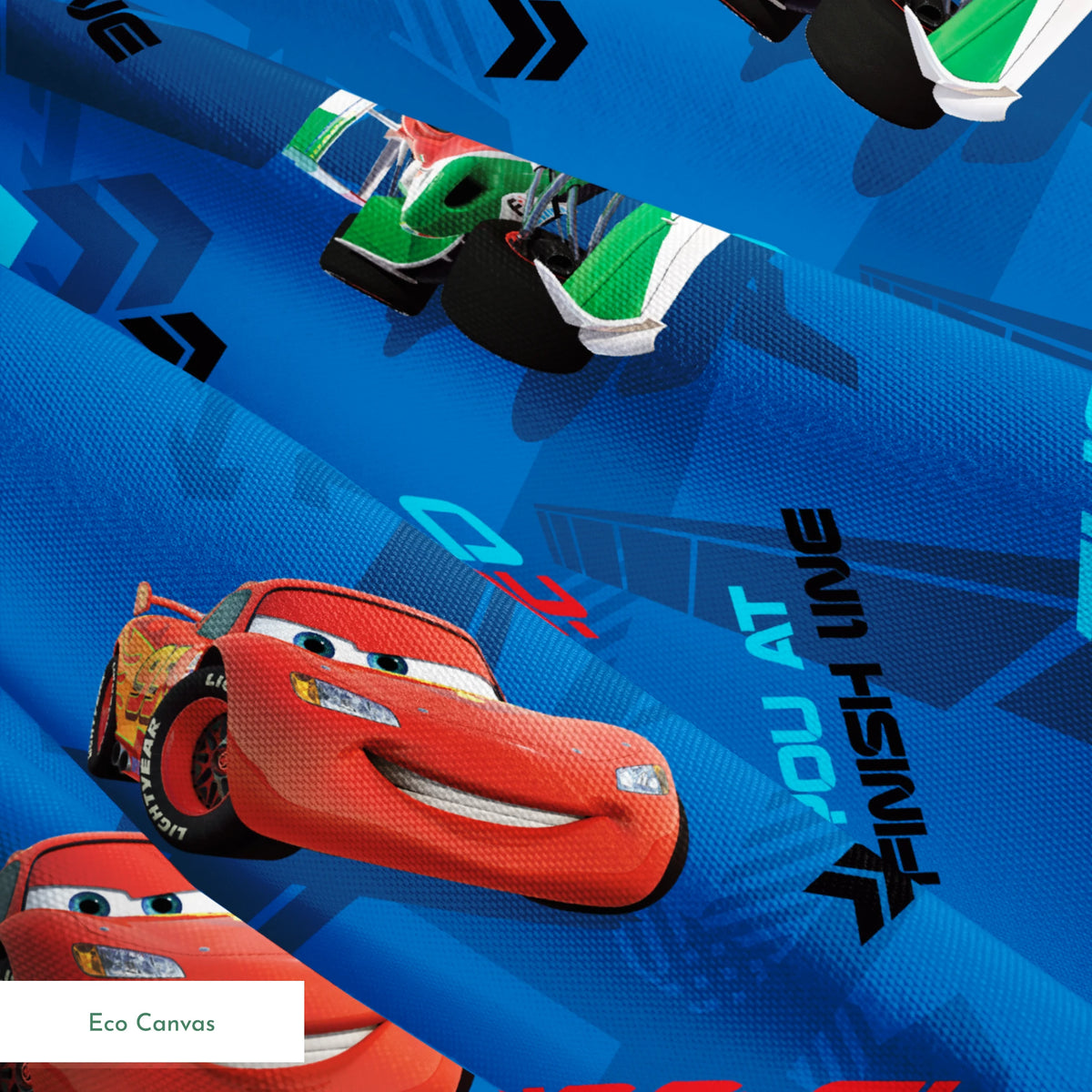 Blue fabric pattern with animated red race cars, "The World of Cars" text, and directional arrow designs springs ecocanvas texture
