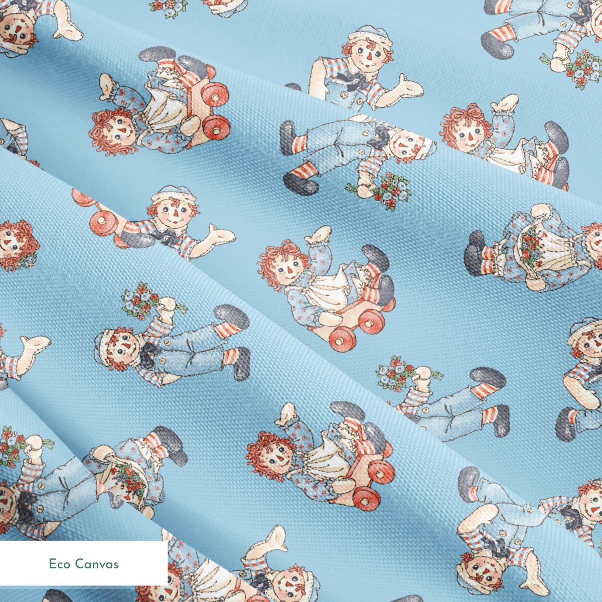 Raggedy Ann and Andy Toss Light Blue | Fabric by the Yard
