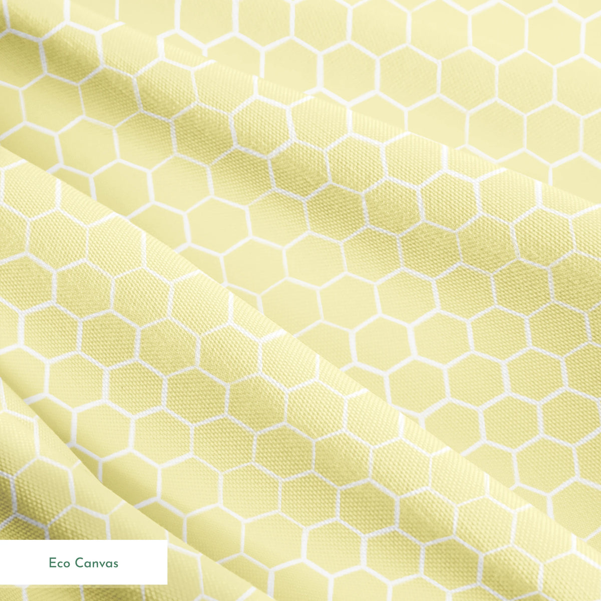 Yellow and white honeycomb pattern fabric designed by Nicole Tamarin with a soft geometric style perfect for bright, cheerful projects. springs ecocanvas texture