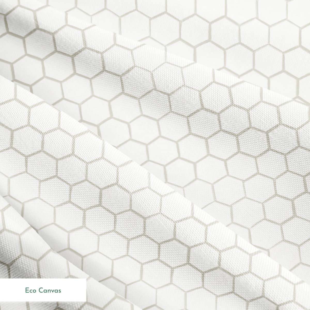 White and beige honeycomb pattern fabric designed by Nicole Tamarin with a subtle, modern farmhouse style. springs ecocanvas texture