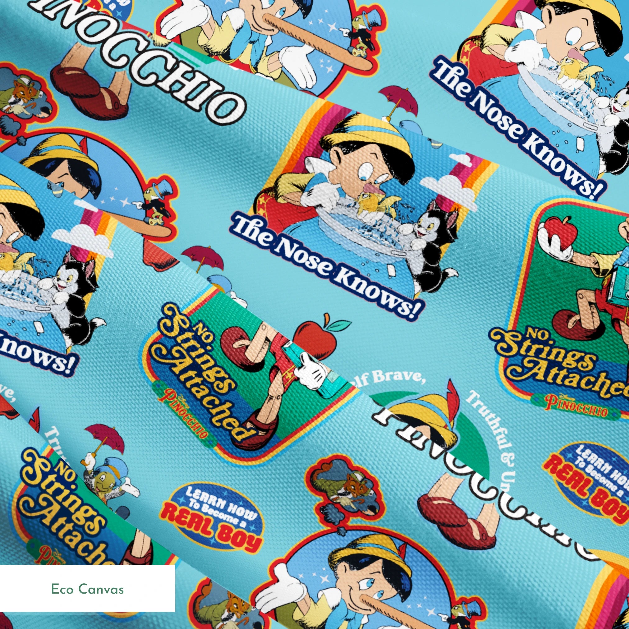 Colorful Pinocchio cartoon pattern featuring puppet characters, slogans, and red apples on teal background springs ecocanvas texture