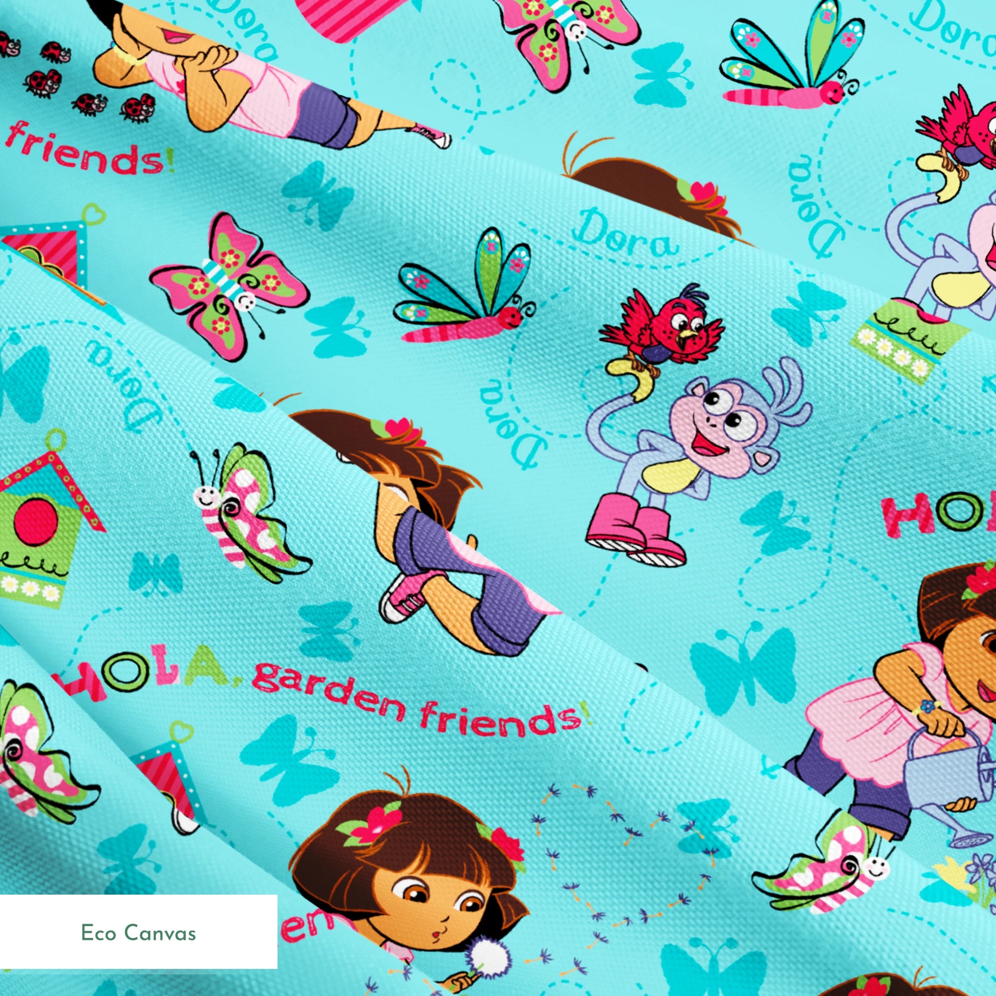 Colorful Dora the Explorer pattern on light blue background springs ecocanvas texture