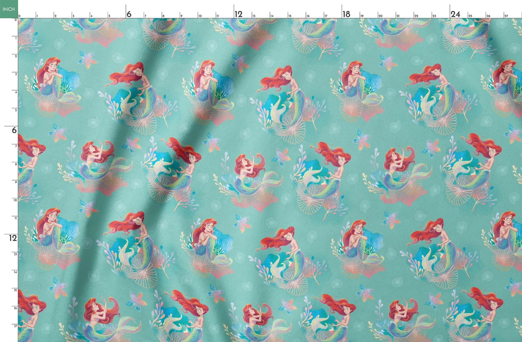 Whimsical teal pattern featuring mermaids with red hair, seashells, starfish, and coral in pastel colors springs fatquarter mockup
