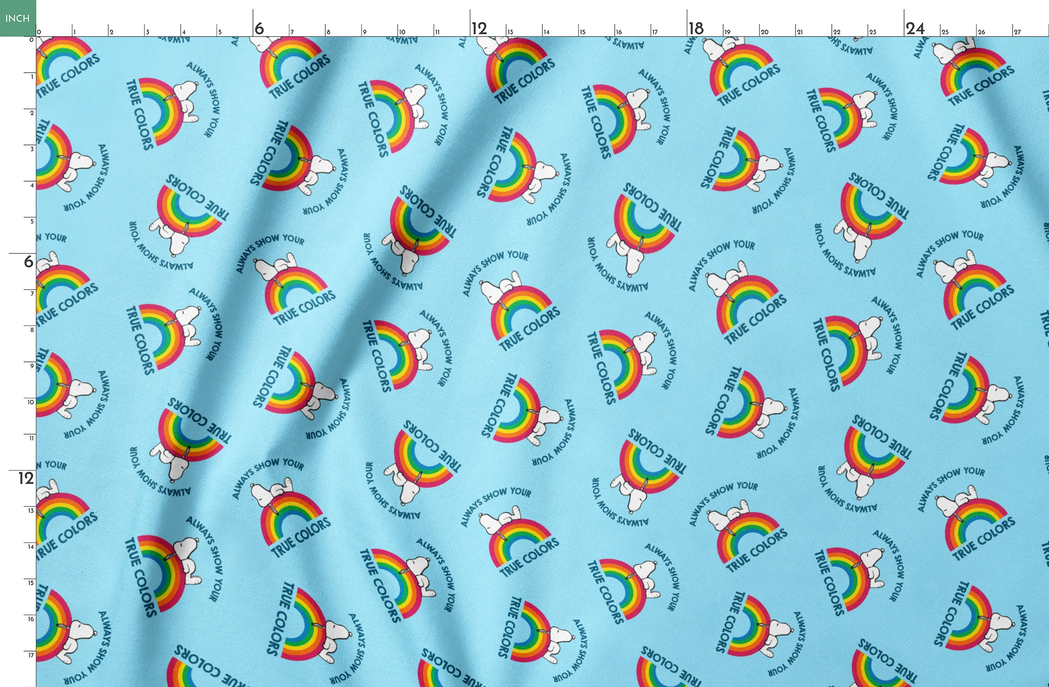 Rainbow Snoopy pattern on light blue background with white clouds and "TRUE COLORS" and "ALWAYS SHOW YOUR" text repeated throughout design springs fatquarter mockup