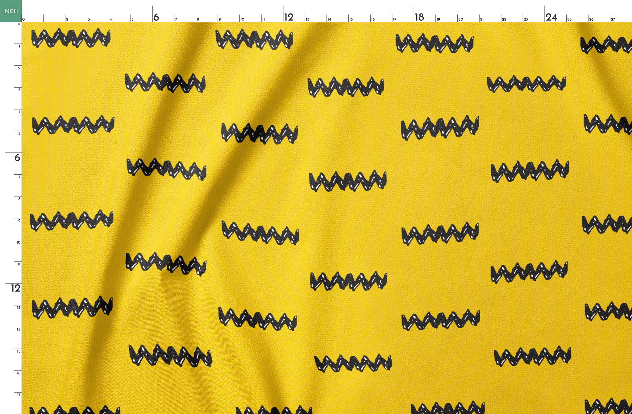 Black Charlie Brown zigzag patterns arranged in four rows against a bright yellow textured background springs fatquarter mockup