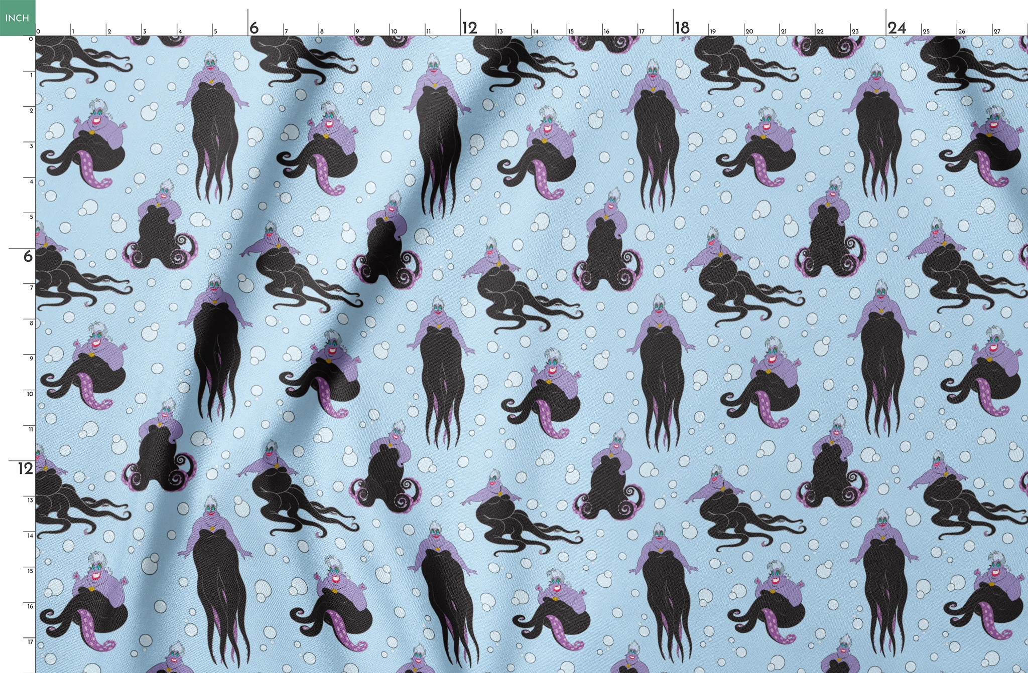Ursula with black tentacles swimming in a light blue underwater scene with white bubbles springs fatquarter mockup