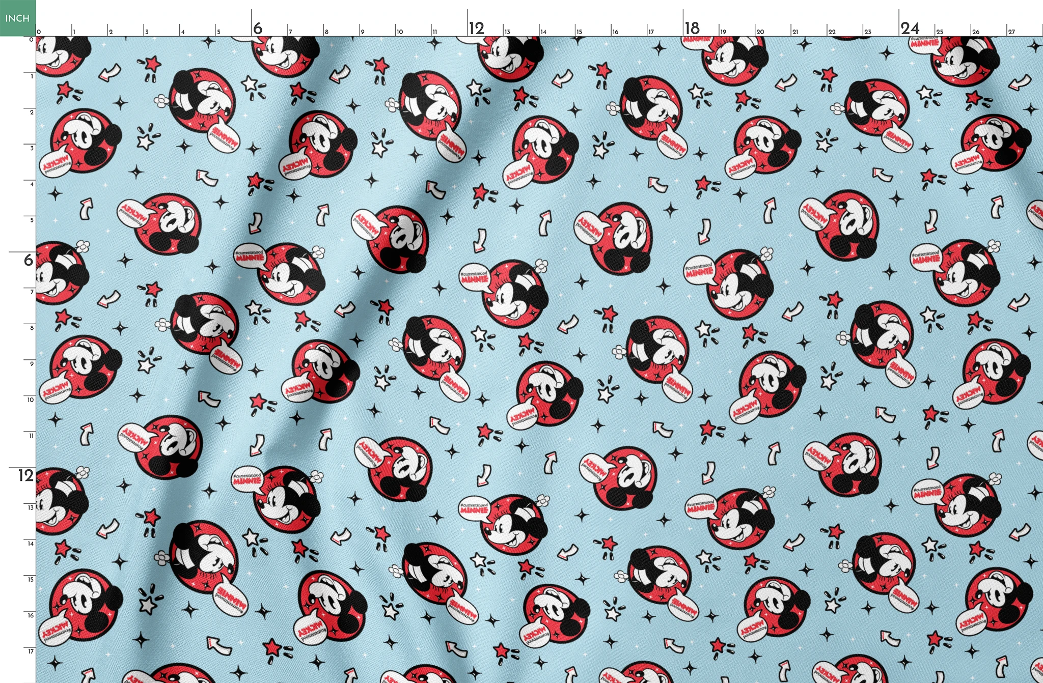 Disney Mickey Mouse pattern with red circular emblems on light blue background with stars and arrows springs fatquarter mockup