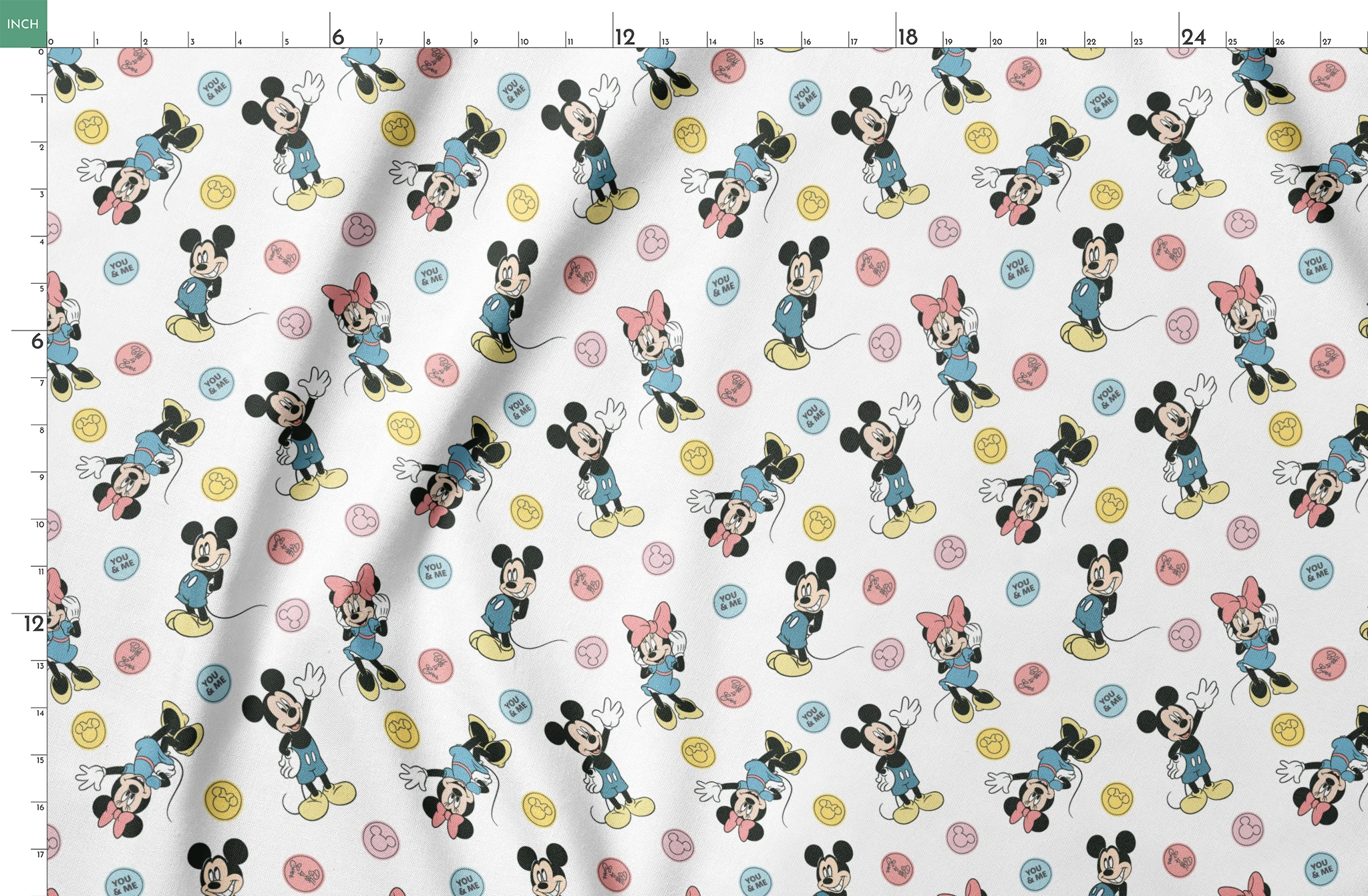 Mickey Mouse and Minnie Mouse cartoon pattern with colorful circles containing phrases on white background. springs fatquarter mockup