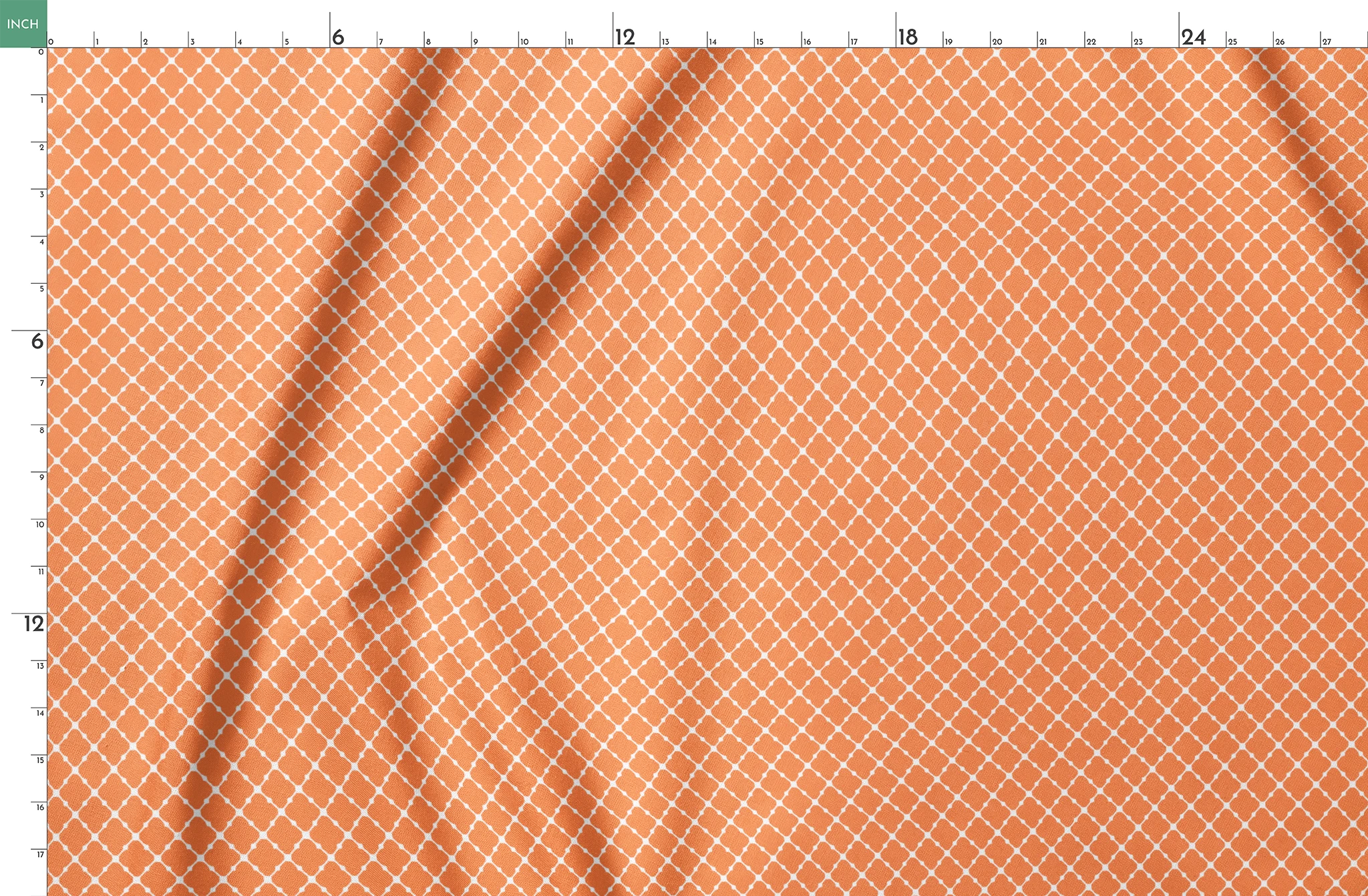 Geometric orange and white pattern with quatrefoil shapes forming a lattice design springs fatquarter mockup