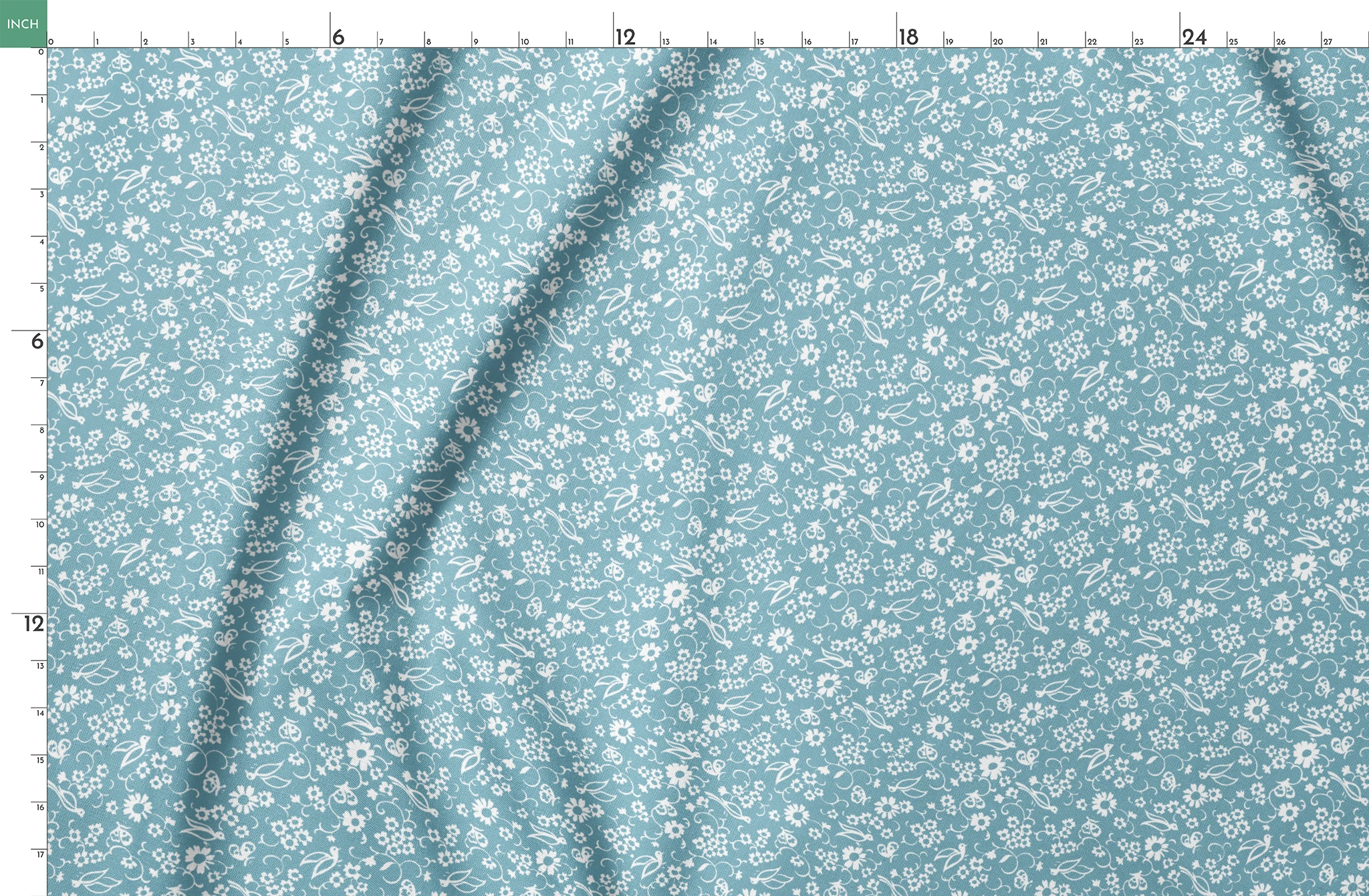 White vintage-style bird and floral silhouettes on a dusty blue background. springs fatquarter mockup