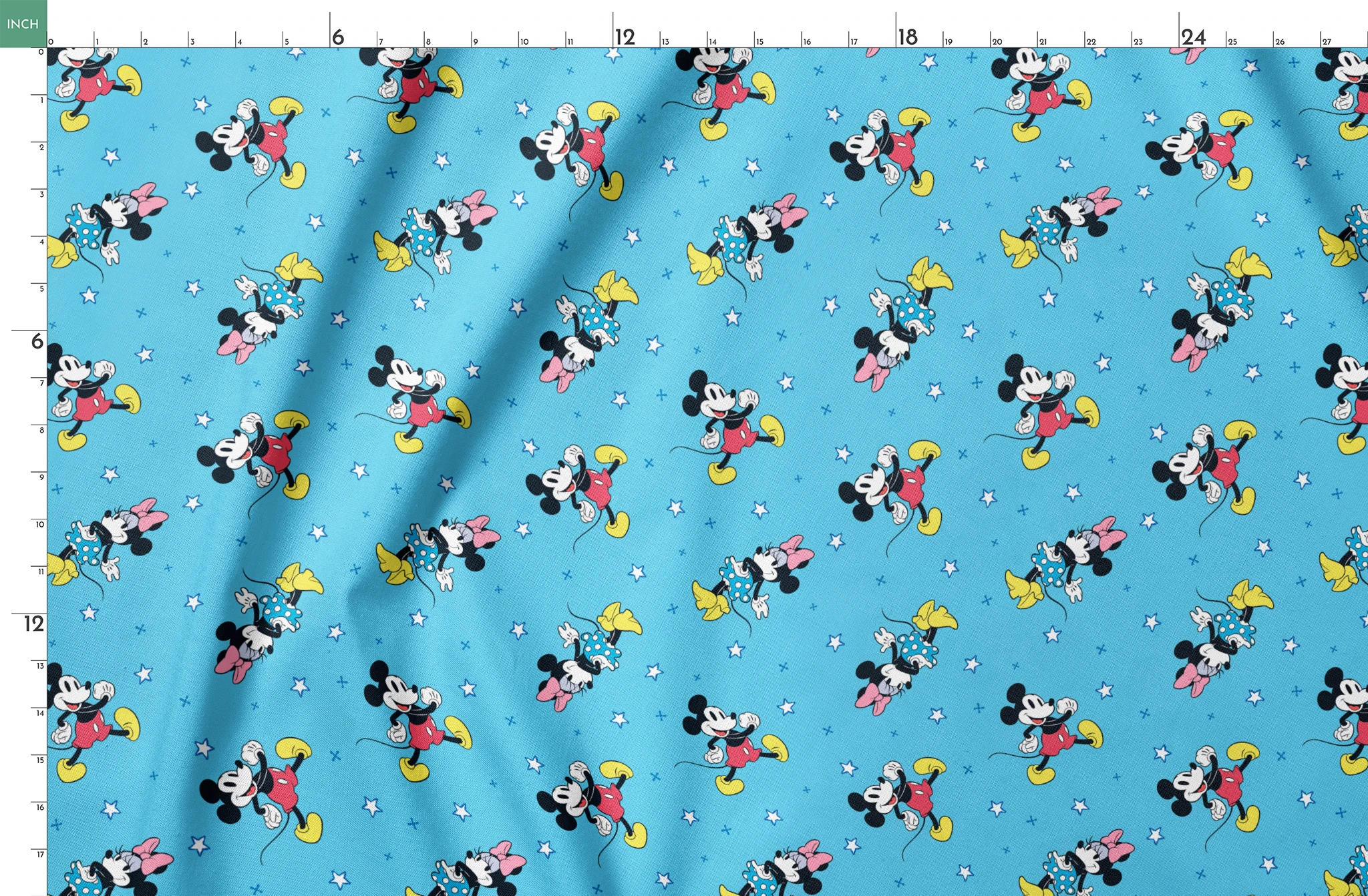 Disney Mickey Mouse and Minnie Mouse characters on light blue background with white stars, pattern design springs fatquarter mockup