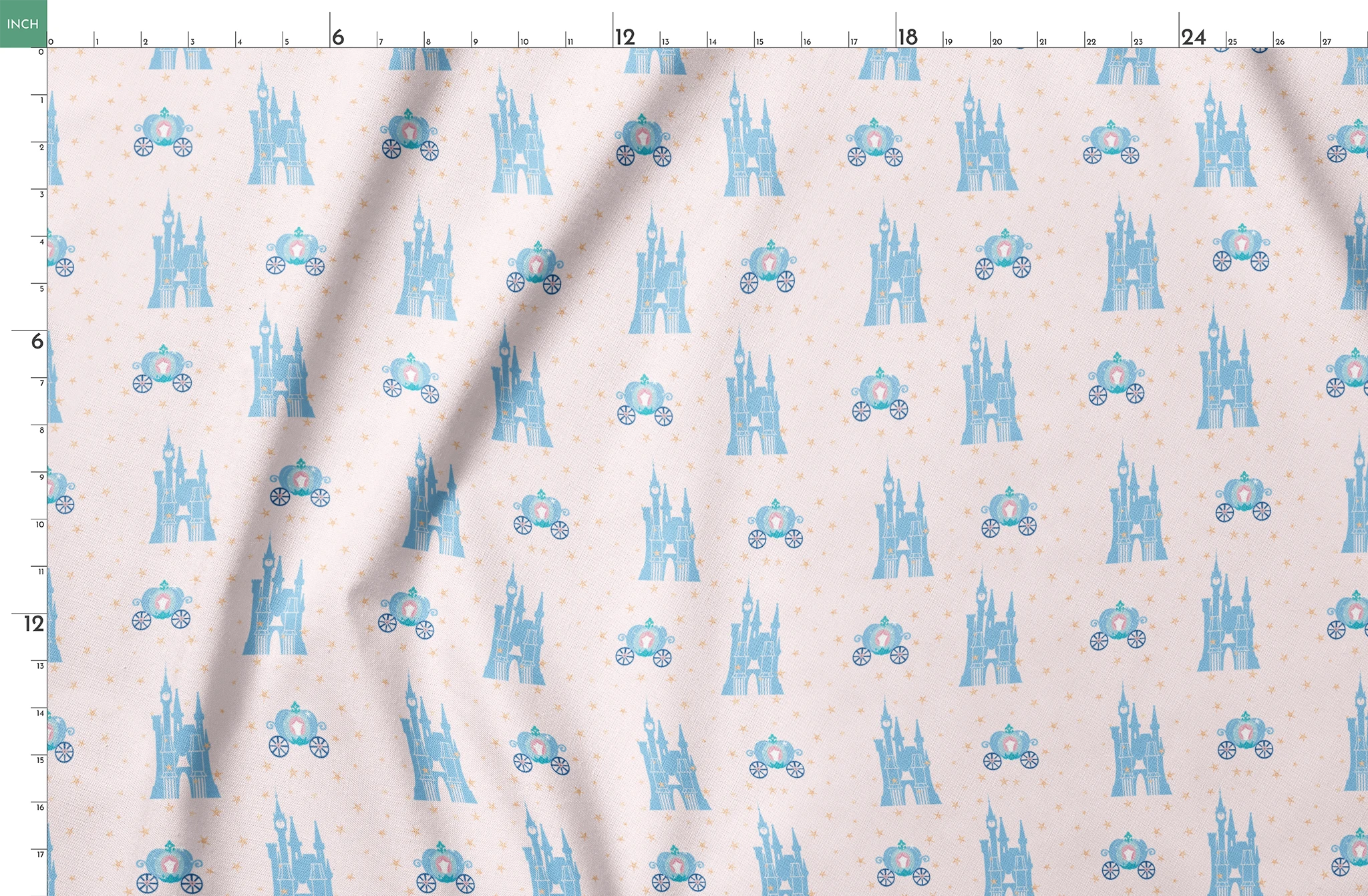 Cinderella pattern with blue castles, carriages, and gold stars on pale pink background springs fatquarter mockup