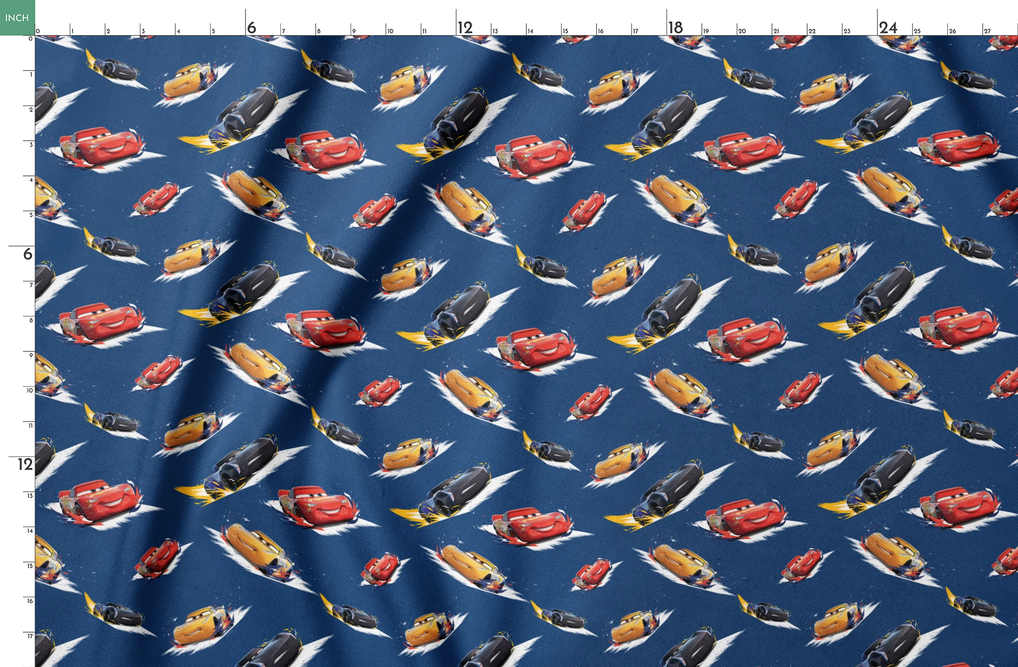 Animated race cars from Disney's Cars movie speeding across a blue background with white motion streaks springs fatquarter mockup